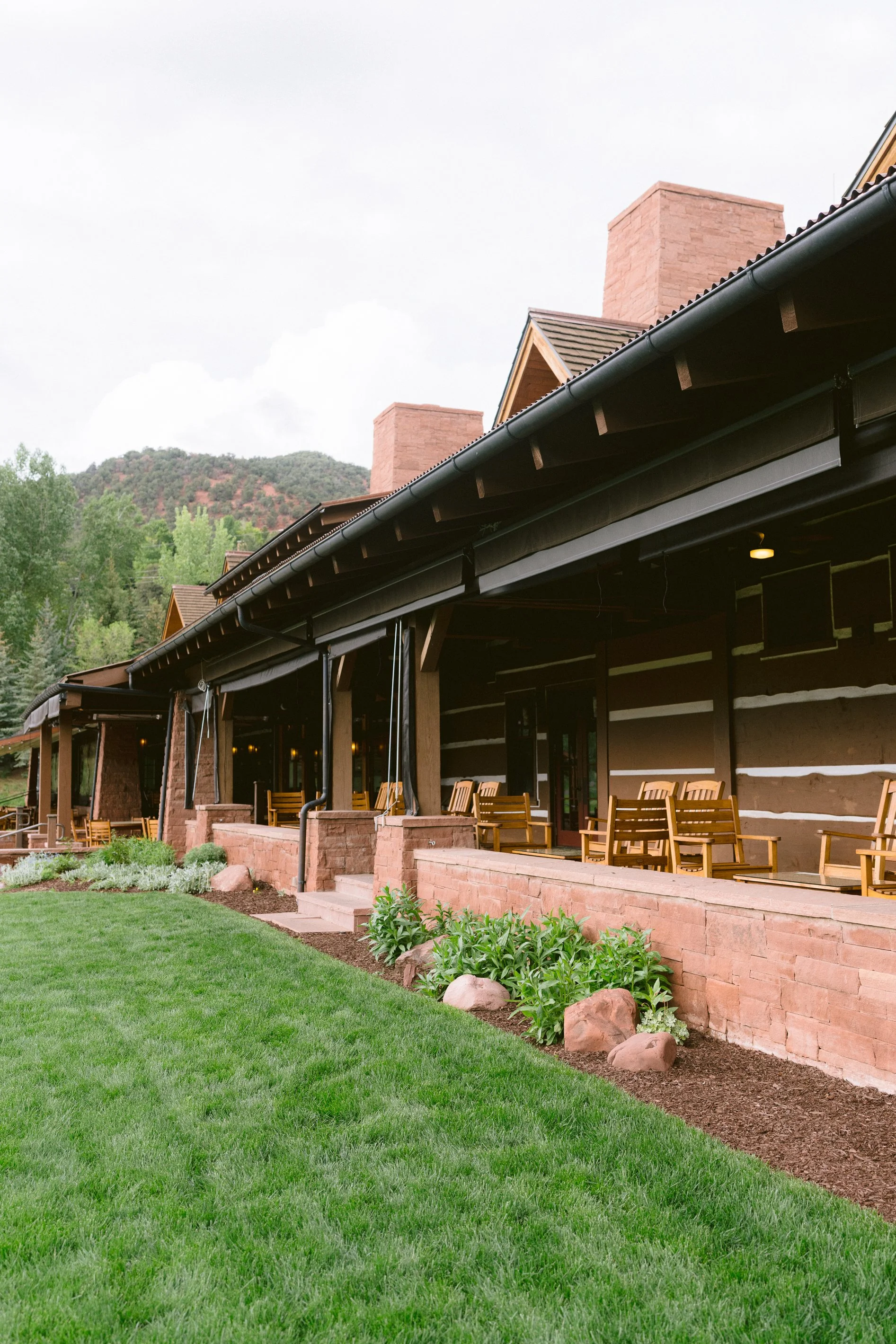 Roaring fork club in basalt back porch with chairs overlooking the golf course