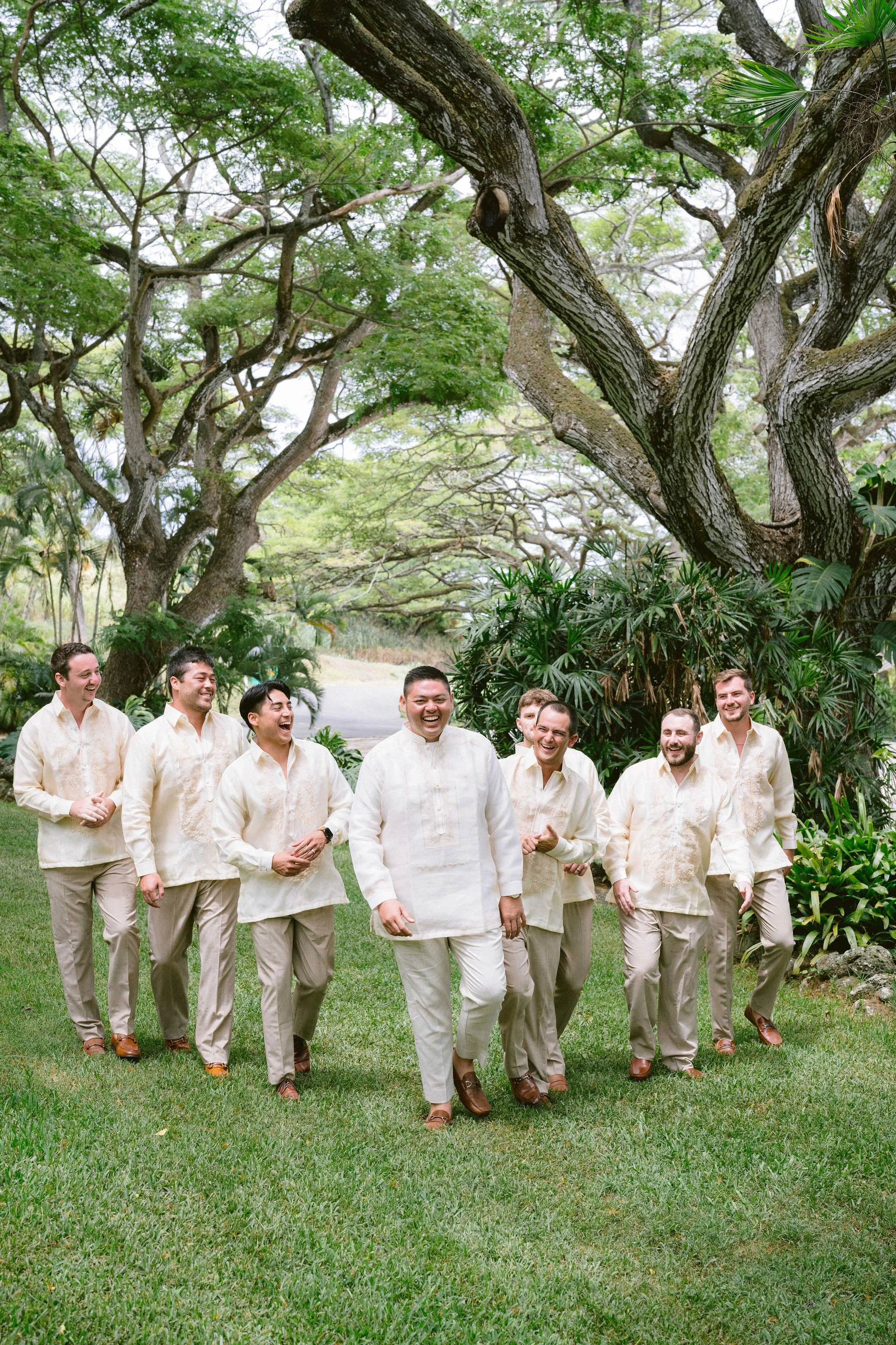 groom and groomsmen enjoying time together on wedding day