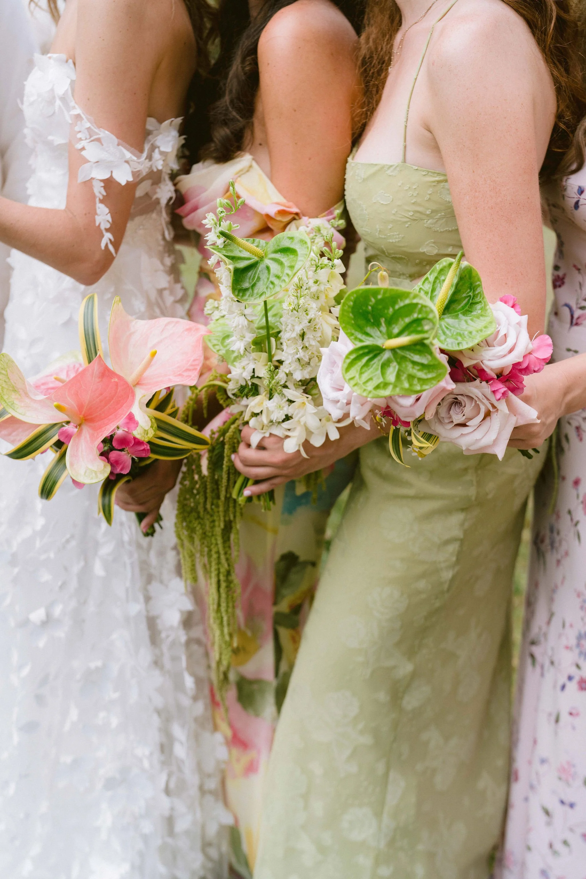 tropical floral bouquets for bridesmaids at kualo ranch wedding