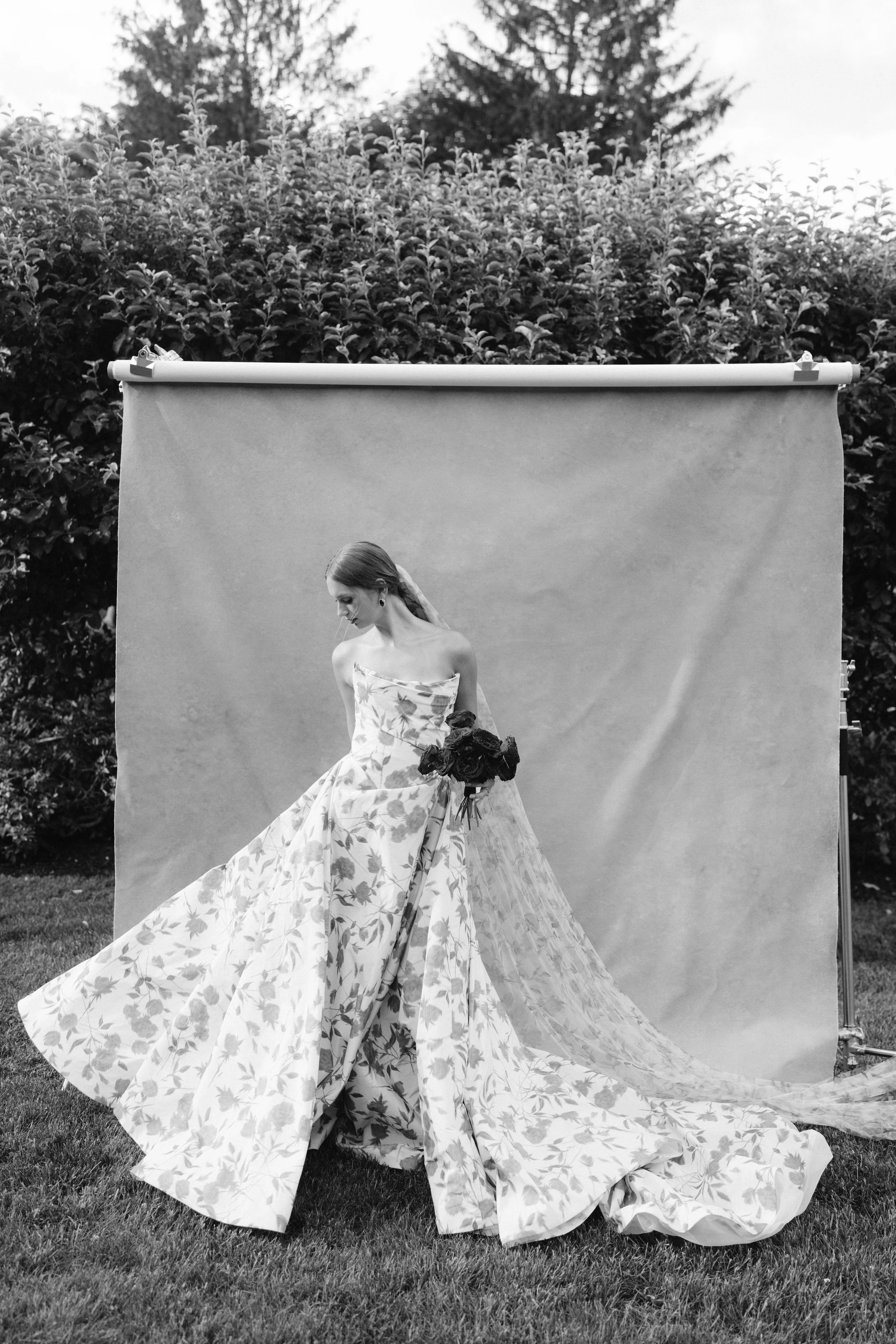 Armour House in Lake Forest wedding venue with bride in front of a canvas backdrop