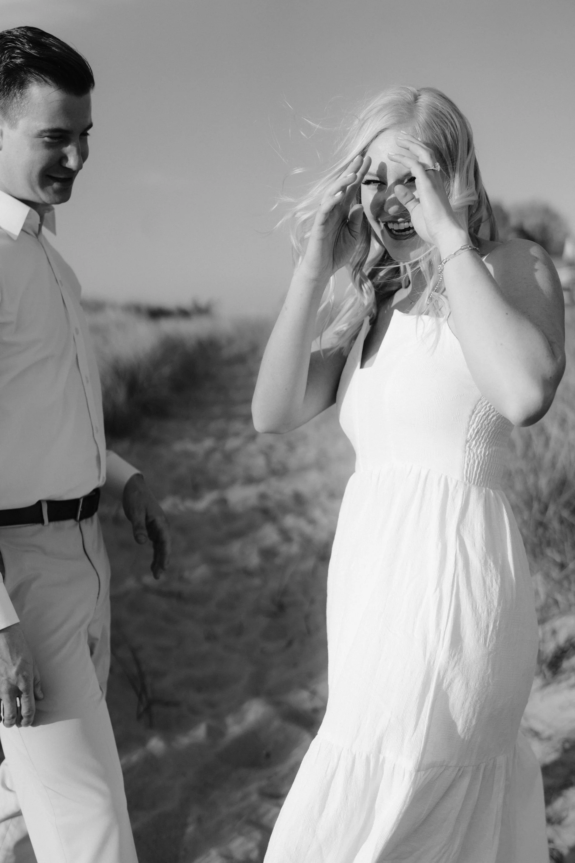 black and white New Buffalo Lake Michigan Engagement Session by Erika Aileen Photography