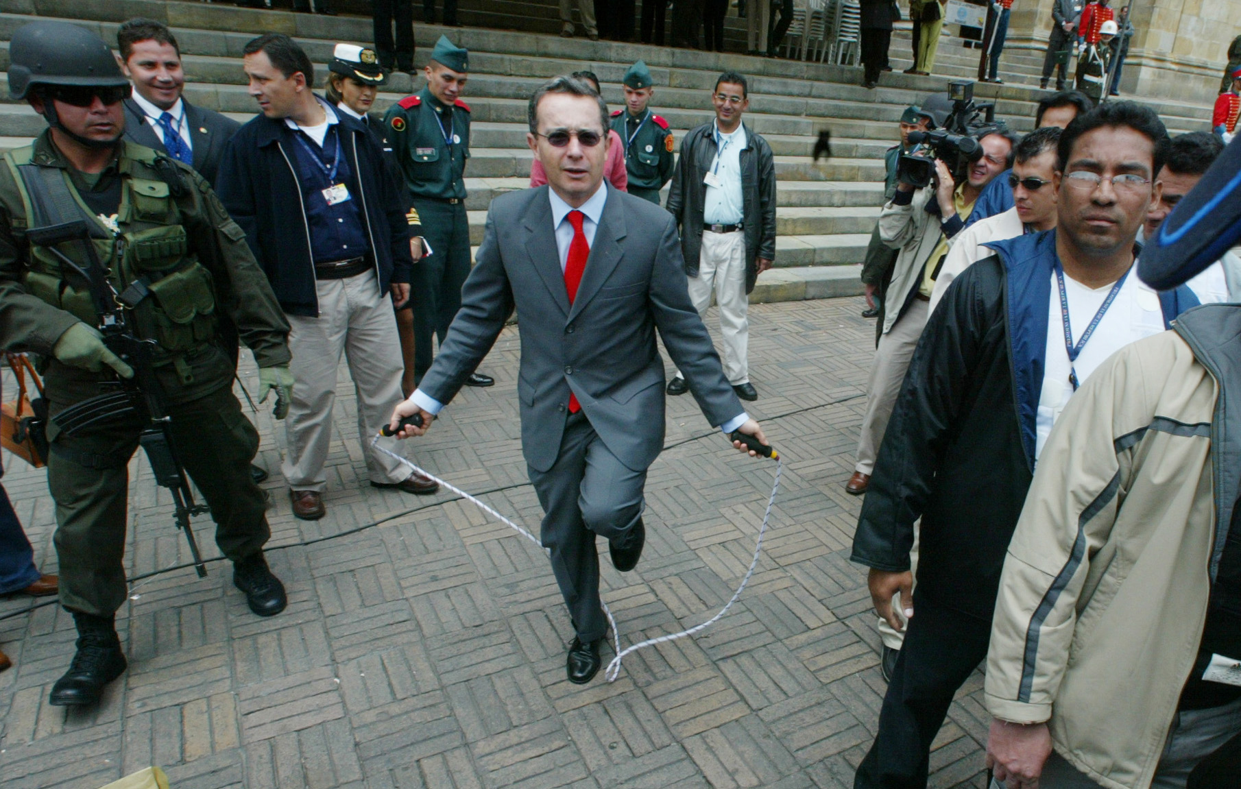  Colombia's President Alvaro Uribe jumps rope in his assistance during the annual March of Solidarity celebrated in Bogota, Colombia,2003. 