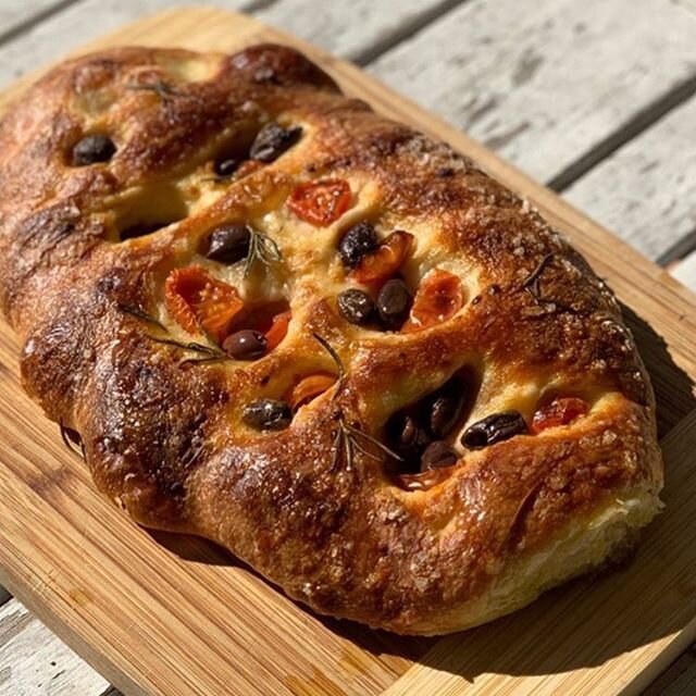 Our focaccia with rosemary, blistered tomatoes, olives and sea salt is definitely a staff favourite! Available every Saturday &amp; Sunday
