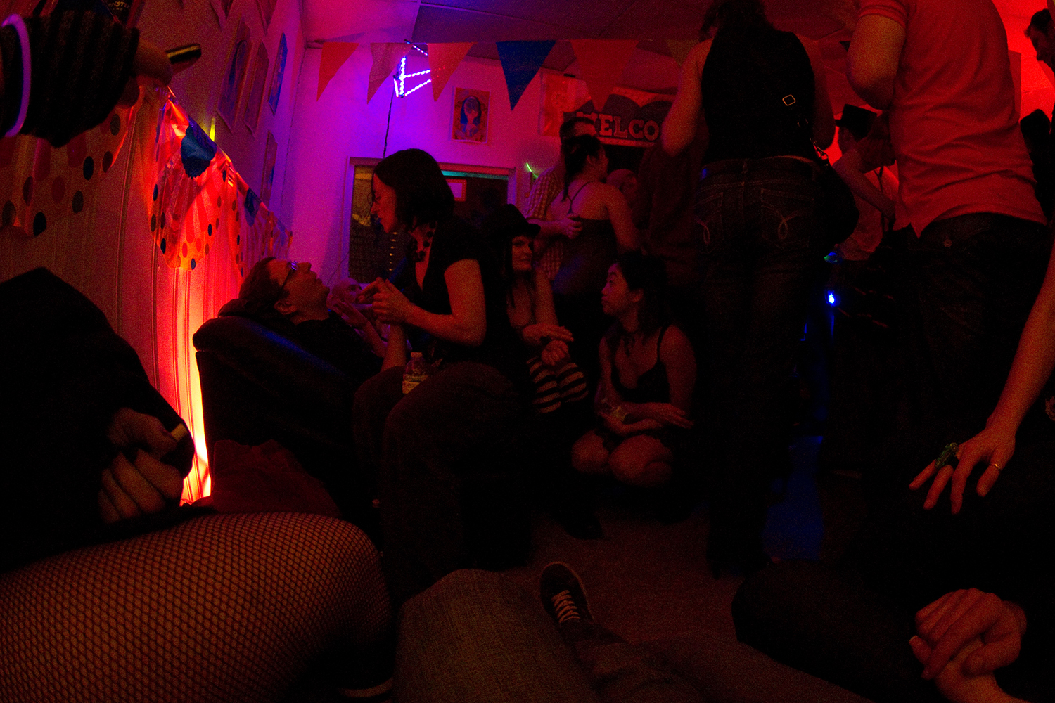  Partygoers relax in the chill area. 