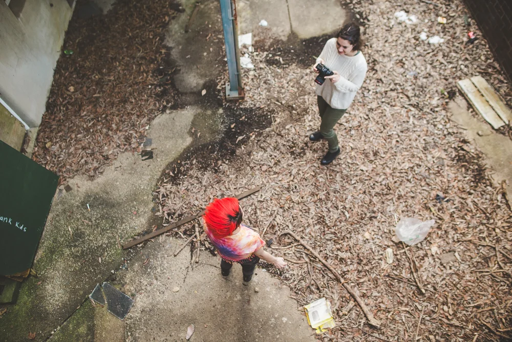 Madeline Rae Mason and I shooting in abandoned places. The ground was covered in a thick layer of leaves and rubbish all stuck together.. we didn't dare touch anything! While Maddy was modeling against the broken windows and half cracked doors, she kept getting freaked out that a hand would come out of the darkness and grab her.