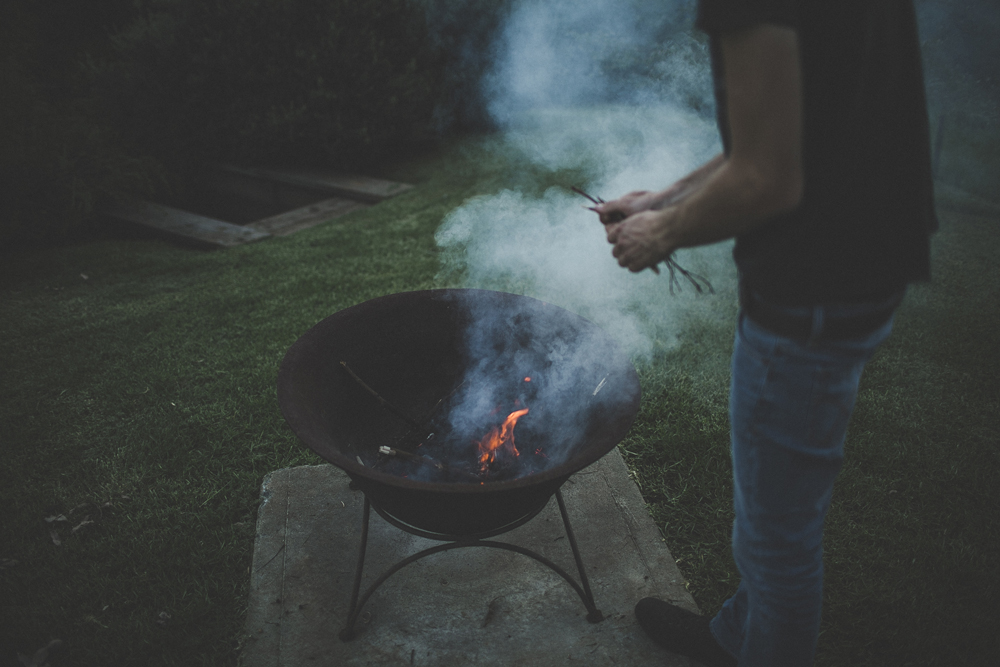 Making and tending to the bonfire on chilly evenings. 