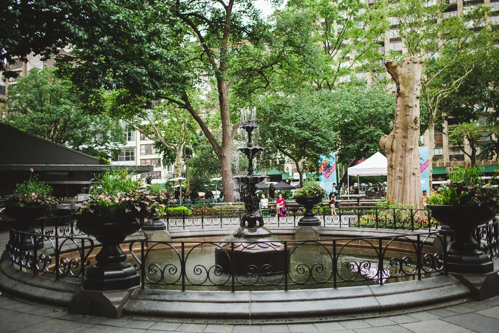  walking through madison square park. 