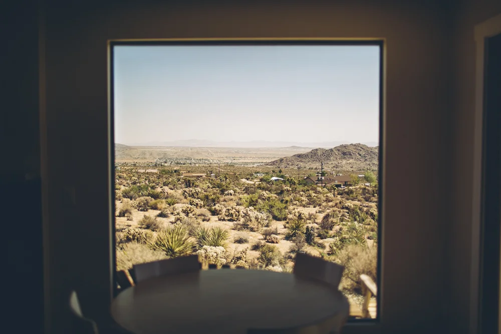  Our AirBnb house had gorgeous windows which spanned from the ceiling to the floor - perfect for gazing out to watch the clouds and animals scurrying around in the bushes when it was too hot to go outside during the day. 