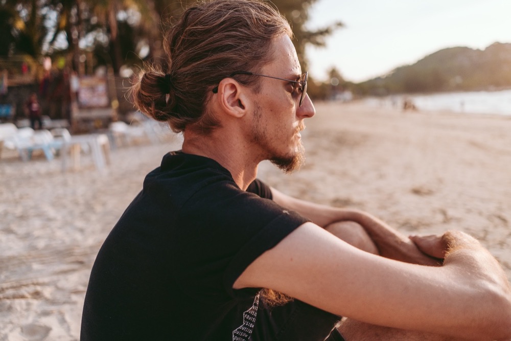  Dan and I resting on Bangtao beach while I was super sick! 