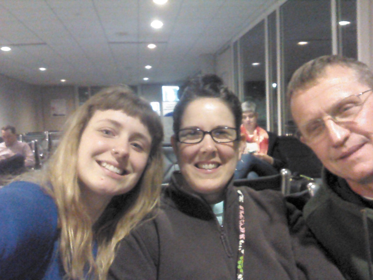 At the airport waiting for our plane, 5:30am so early!