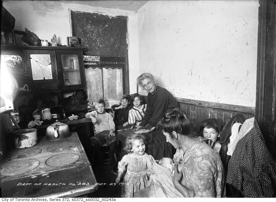 Interior of slum house, Toronto Courtesy of Toronto Archives.