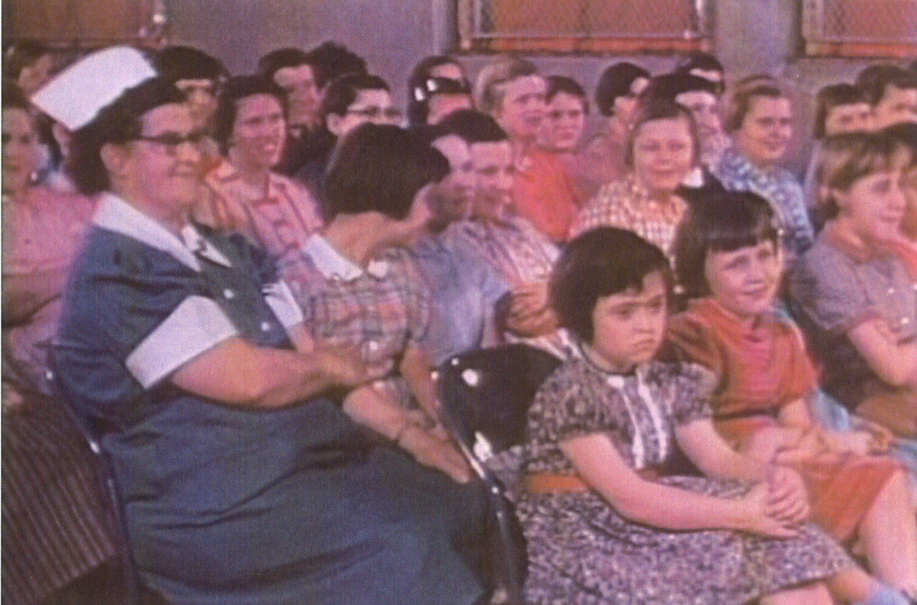 At Sunday church service in the gym. Note the short “pudding basin” institutional haircuts on the girls. Photo courtesy Archives of Ontario.