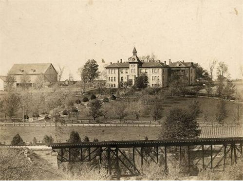 ph 10814: Wellington County House of Industry and Refuge, view from south side of the Grand River, ca. 1907-1914. Photographer unknown.