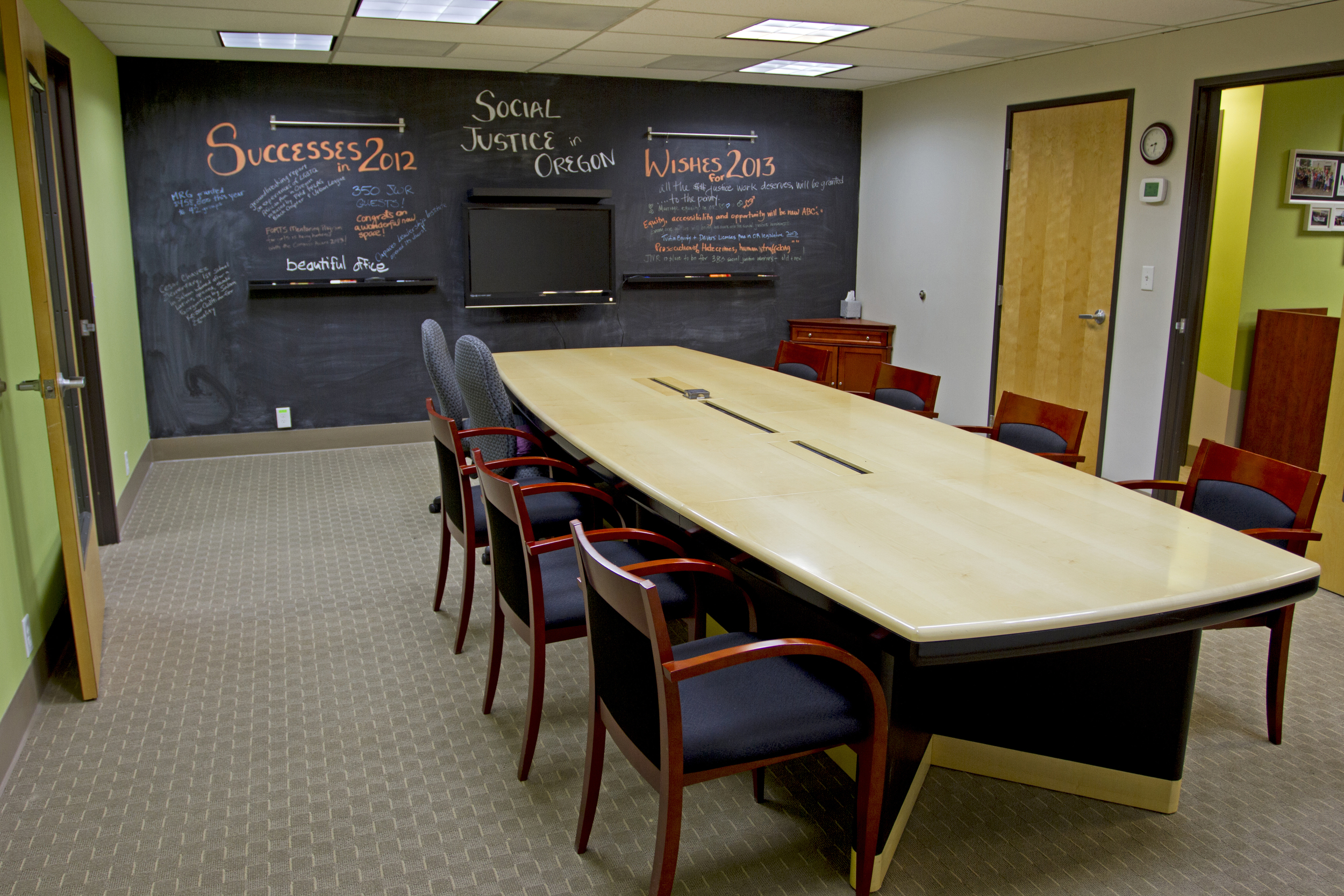  After: one of the main goals was to provide a dynamic gathering&nbsp;space for MRG to meet and discuss ideas. &nbsp;Chalkboard paint and picture rails give the members plenty of space to interact, and share ideas, while also diminishing the presence