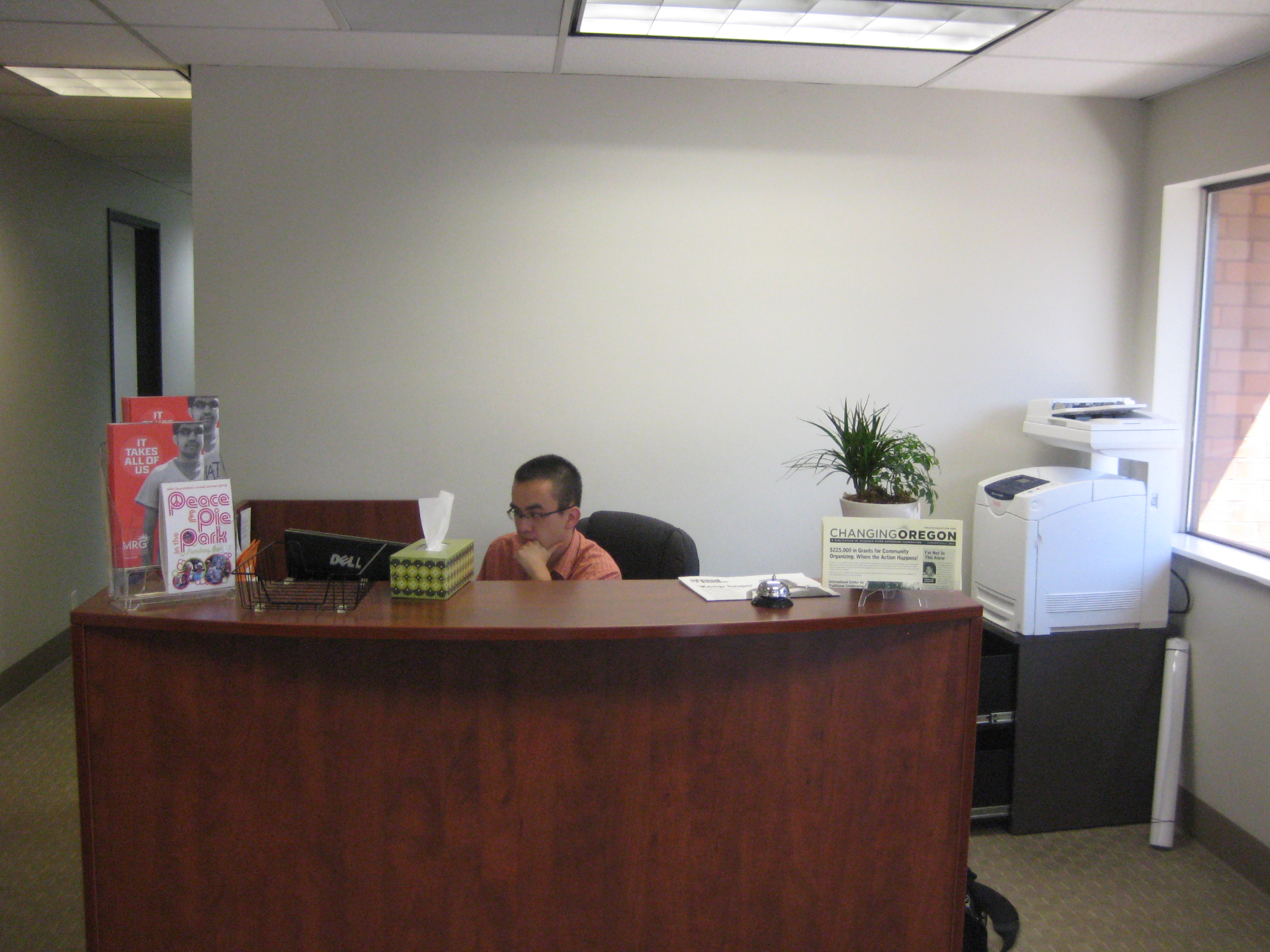  Before: the reception area is basic beige. 