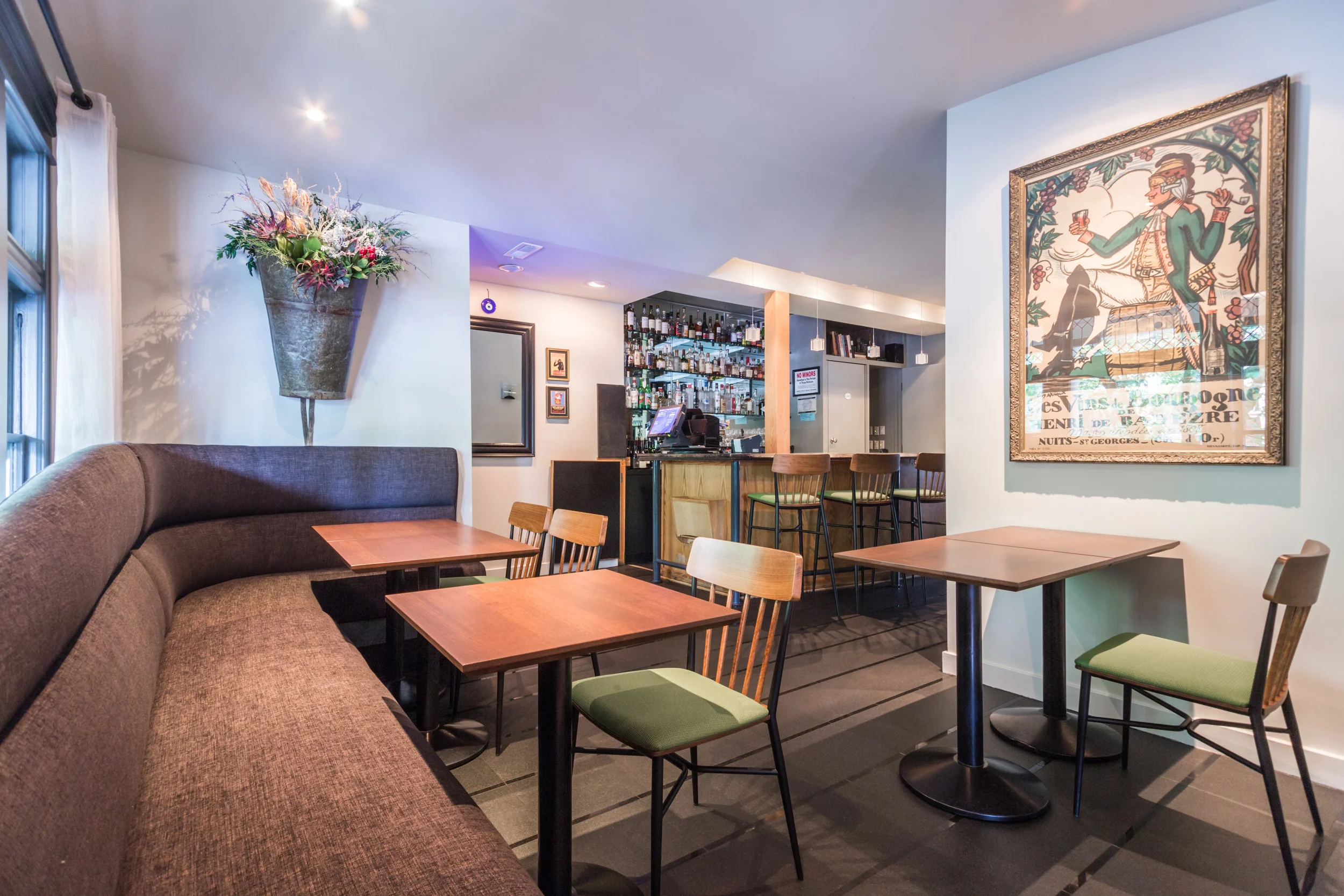 Paley's Place Bistro seating. The restaurant has an extensive collection of original art imported from Europe. 