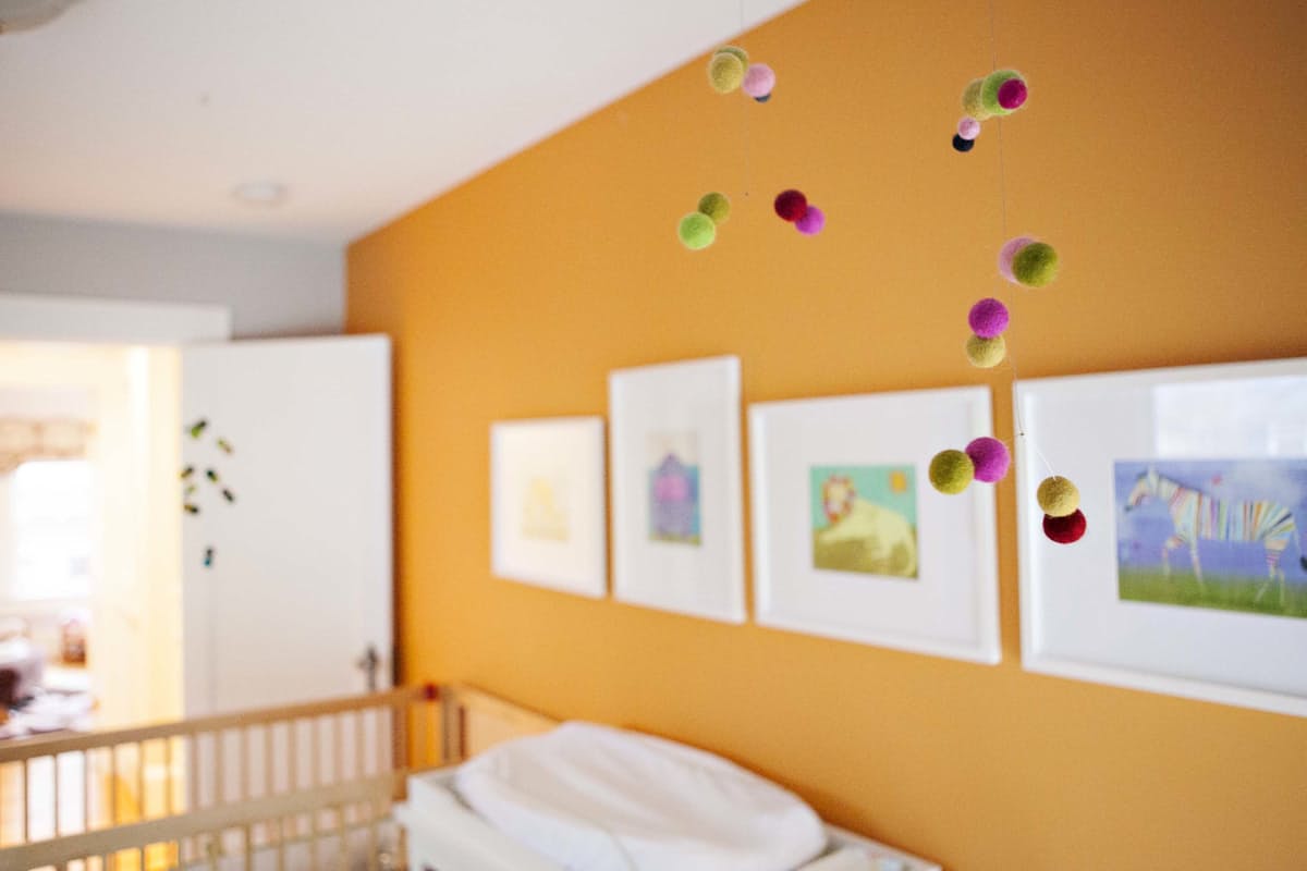 The twin's nursery as shot for Apartment Therapy . Photography by Heather V. Keeling . 