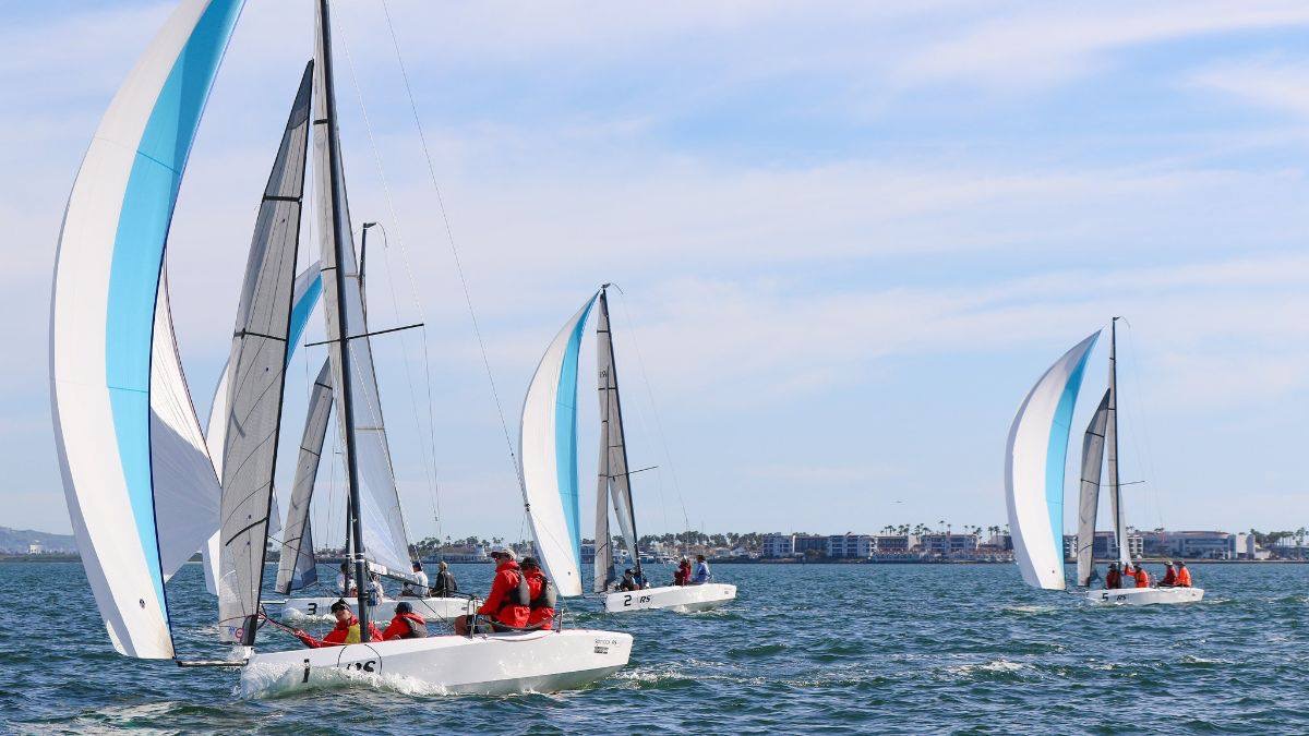 RS21 fleet sailing downwind.