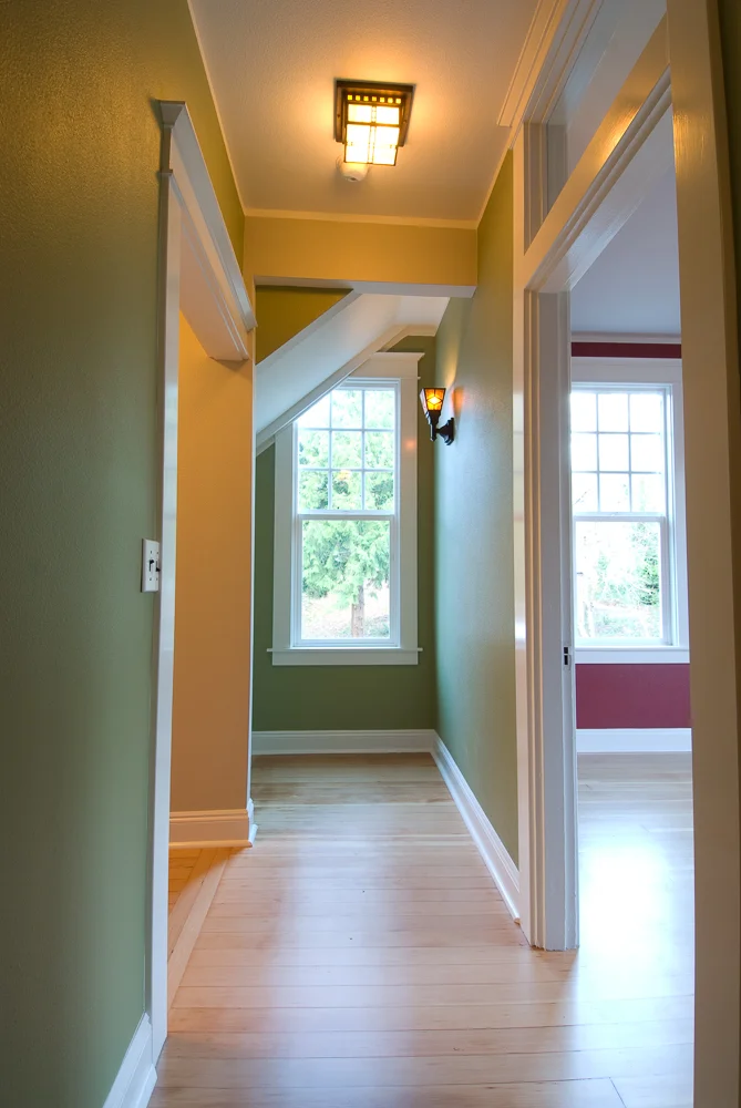 Hallway and top of same stairs after.