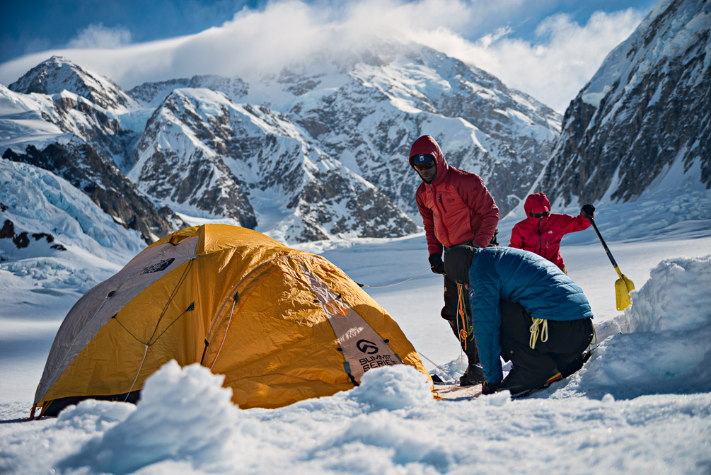 Setting up Camp 1 with Denali as background.