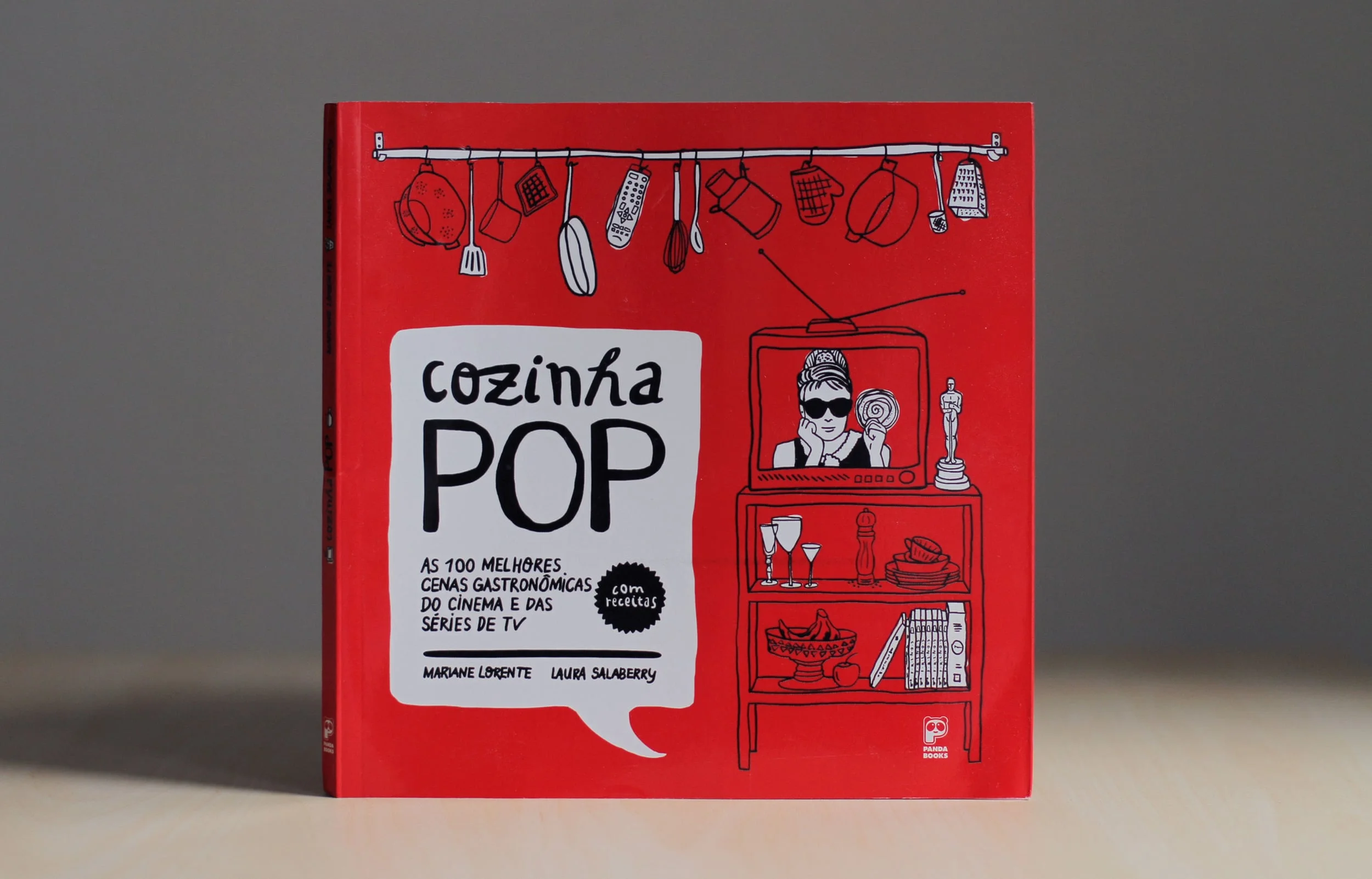 Cozinha Pop by Laura Salaberry and Mariane Lorente {2014 - Panda Books} Cozinha Pop (Pop Kitchen) is a recipe book that gathers 100 food scenes from movies and TV. Pages are fully illustrated, mixing movie scenes, pictures of characters, and food elements. The book is on its 2nd edition in Brazil. Credits: Mariane Lorente and I are the authors. I’m also responsible for the design and illustrations.