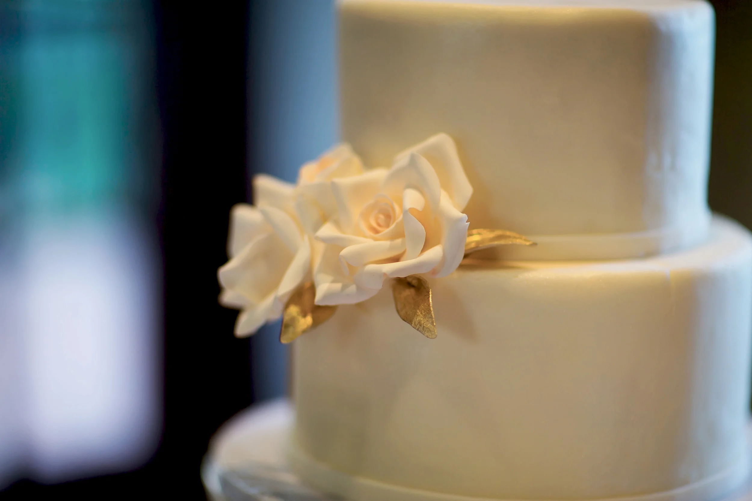 fondant with sugar rose and edible gold leaf credit: Sara Renee Photography