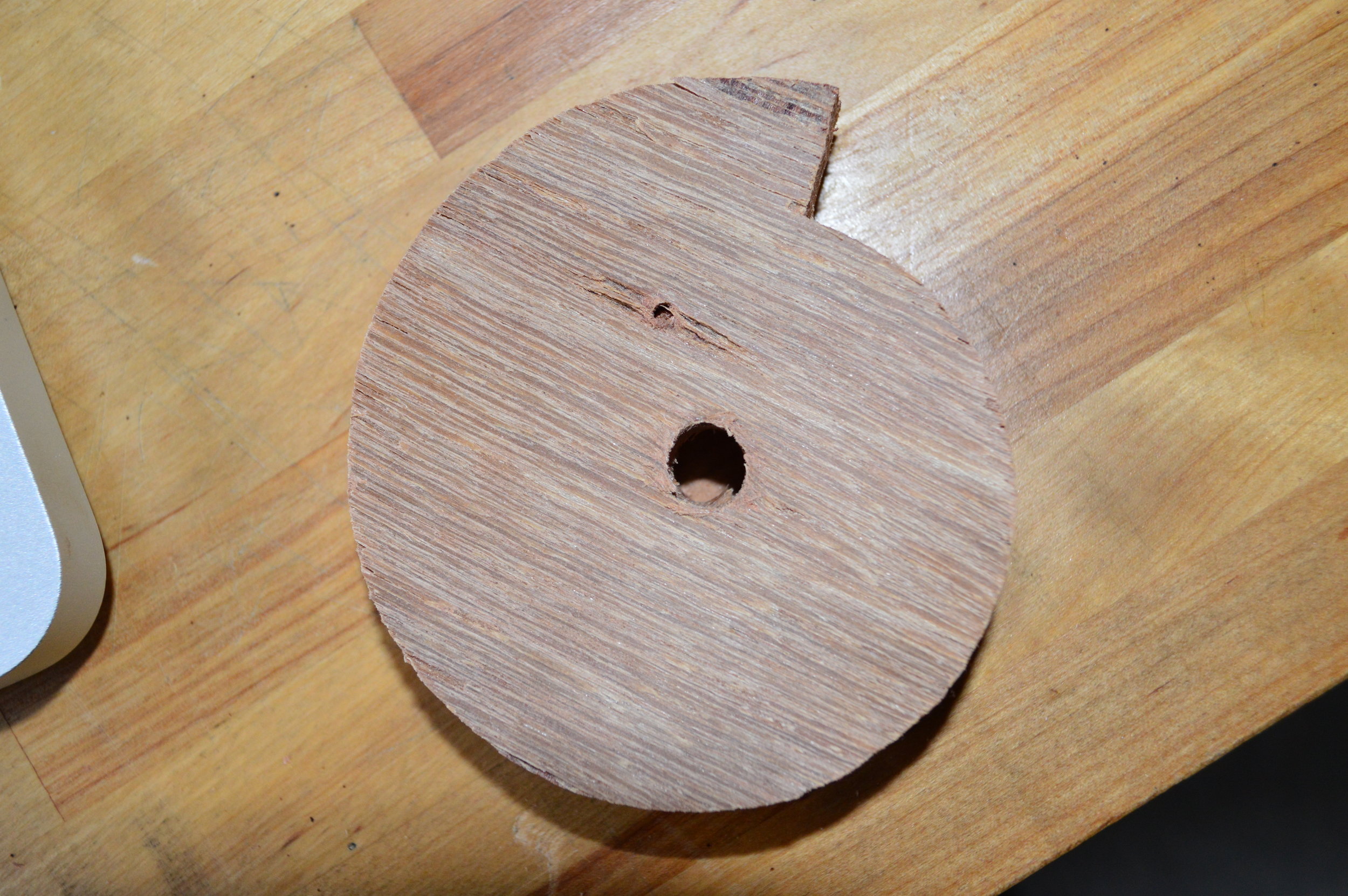 A laser-cut cam for the condom vending machine.