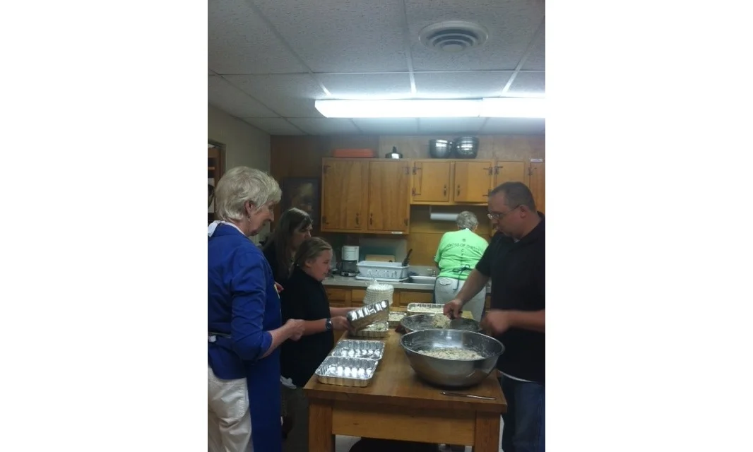 Service Project making freezer meals for shut-ins or those in need of a meal, Joyce, Zoe, Sylvia, Donna, Tim