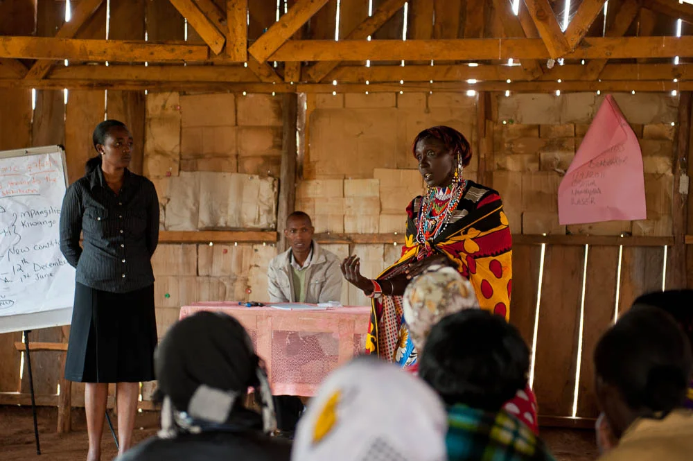 A Justice trainee practices her public speaking skills, guided by Justice Project staff. Photo: Landesa/Deborah Espinosa 