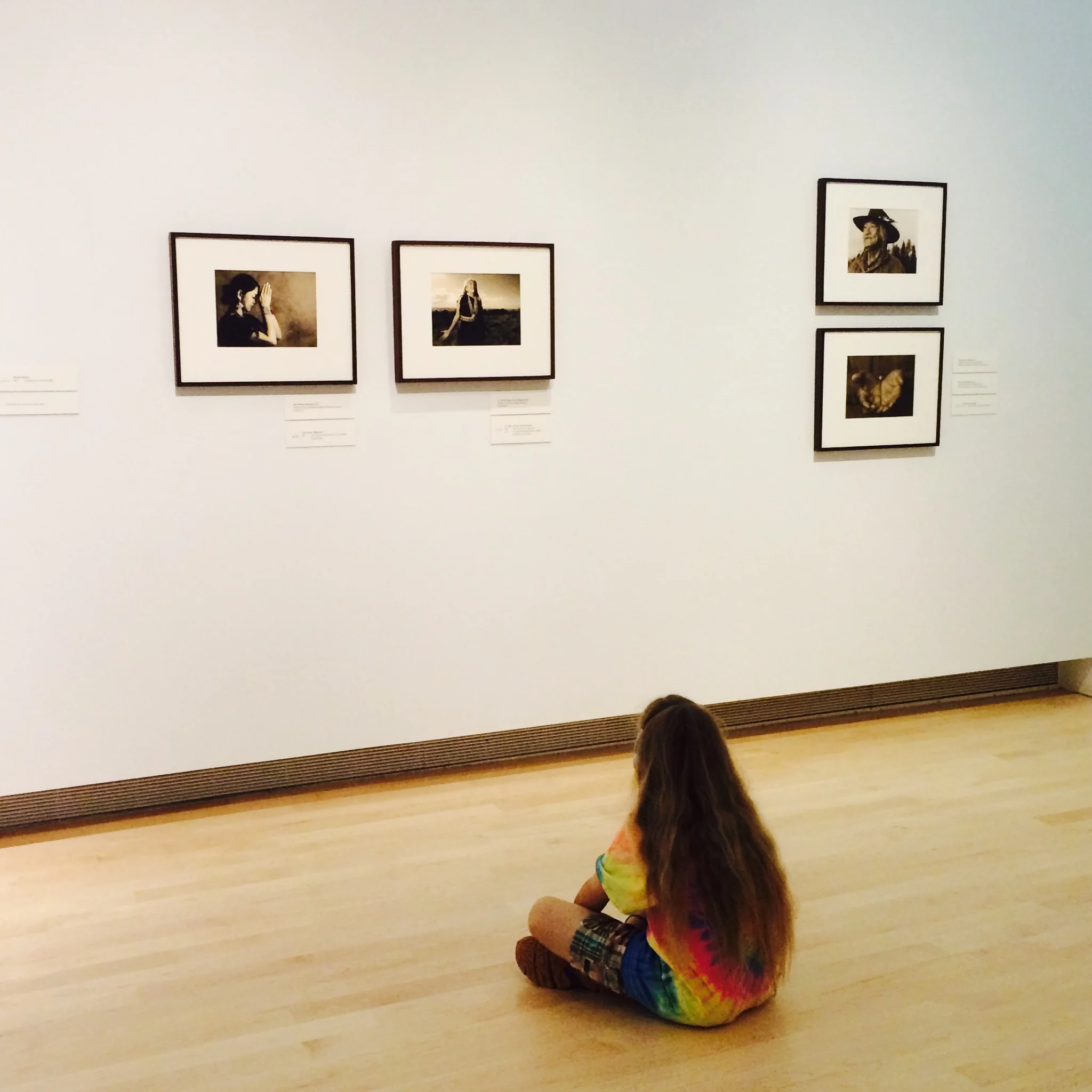 A young patron of the Tacoma Art Museum pauses to contemplate Project 562. Photo: Deborah Espinosa.