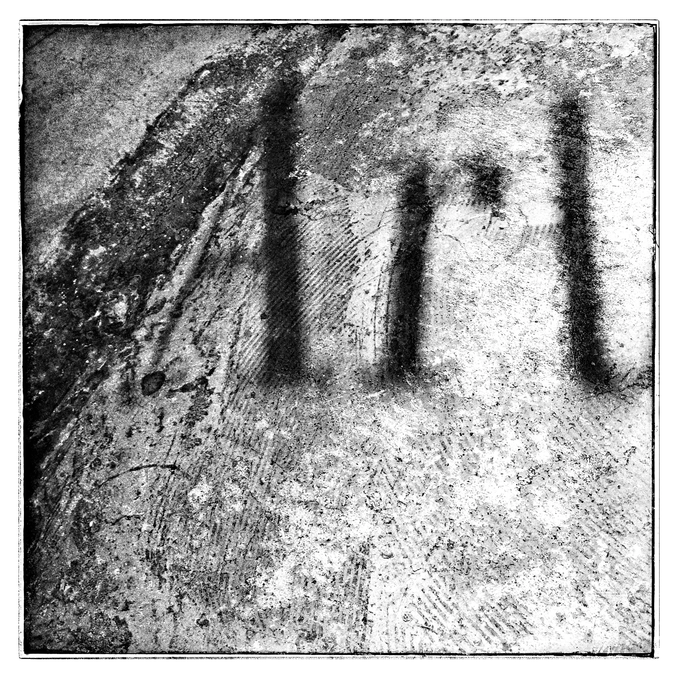 "Art" as a shadow on a concrete floor. Copyright Deborah Espinosa.