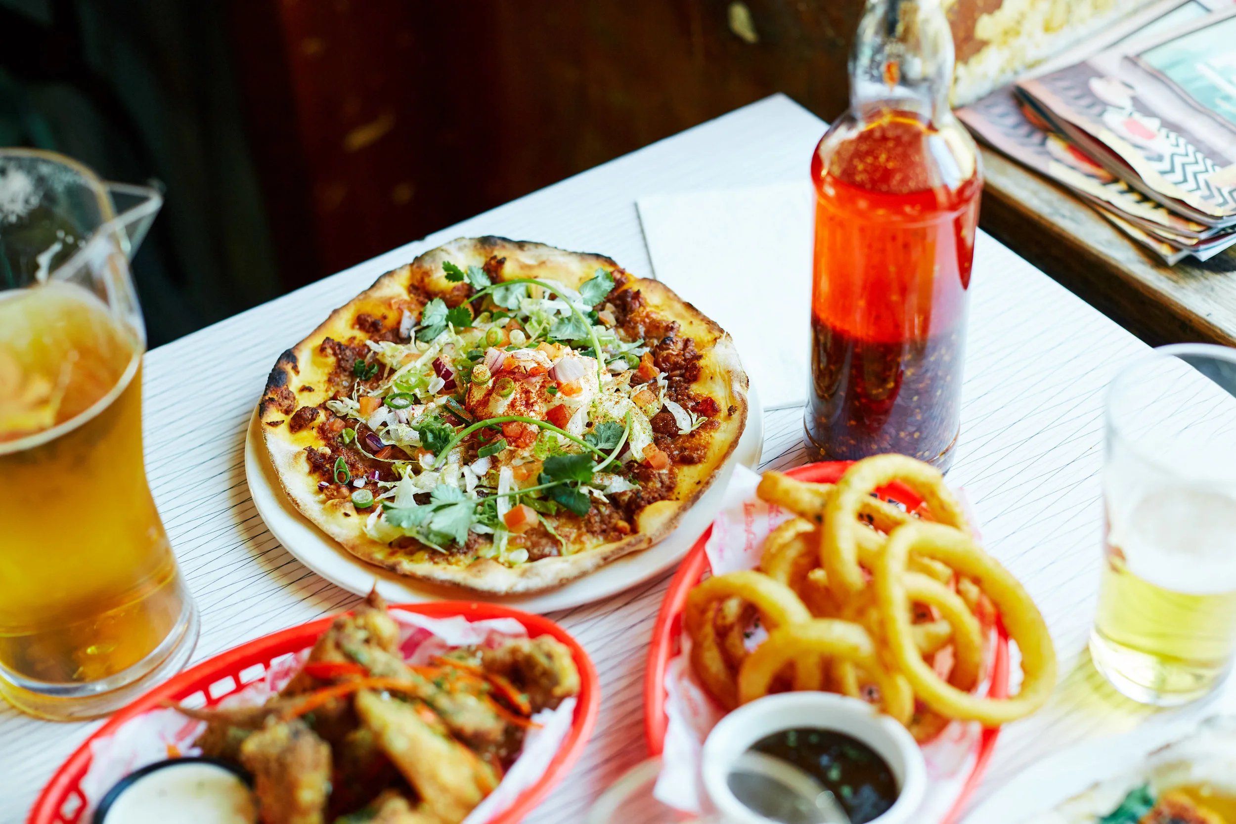 Pizzas, grunge, DJ, rooftop bar, Brunswick. But mostly pizzas. 