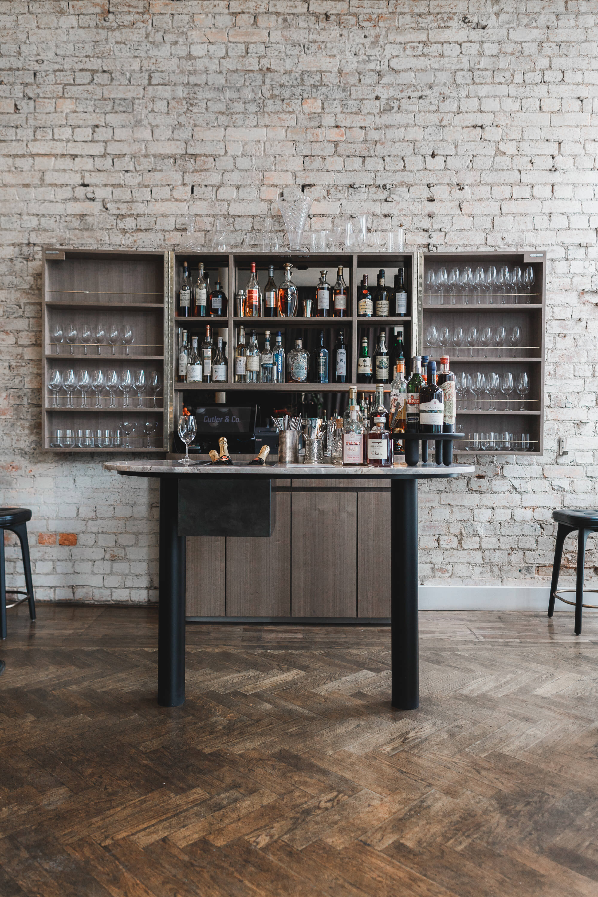 One's a casual wine bar; the other a fine dining establishment, both under the McConnell Group umbrella.