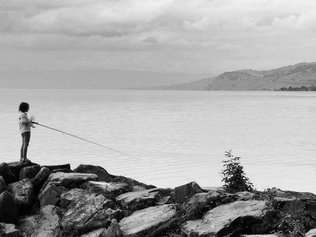 Fish, kid.  Lake Geneva, Switzerland (2013)