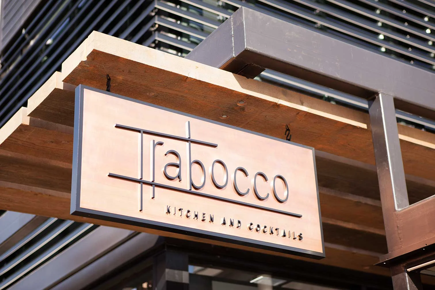 Framed double sided acid-treated Copper sign with 3-dimesnional lettering.