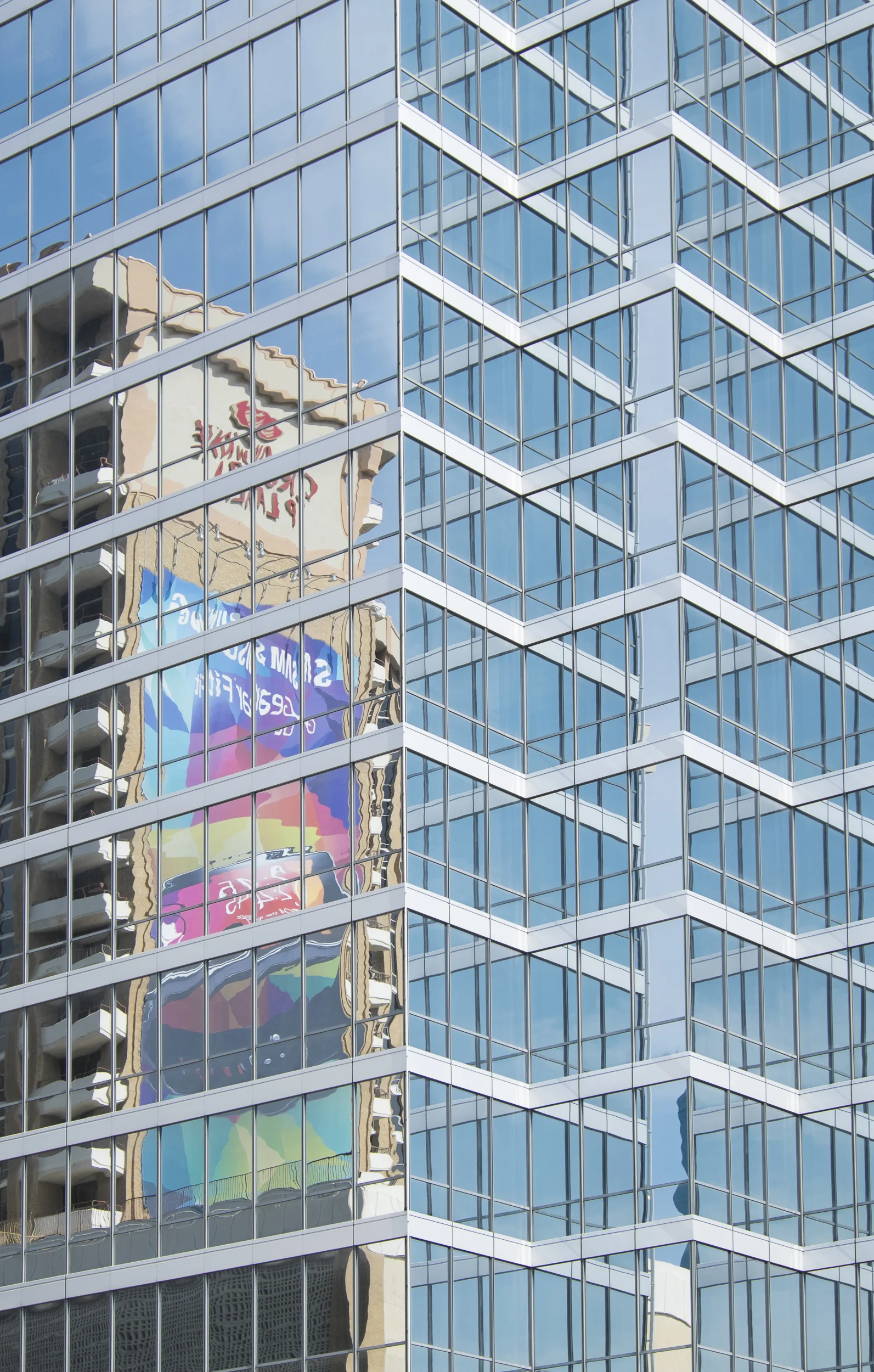Dallas skyscraper provides colorful reflections. Copyright © Kipp Baker, All rights reserved.