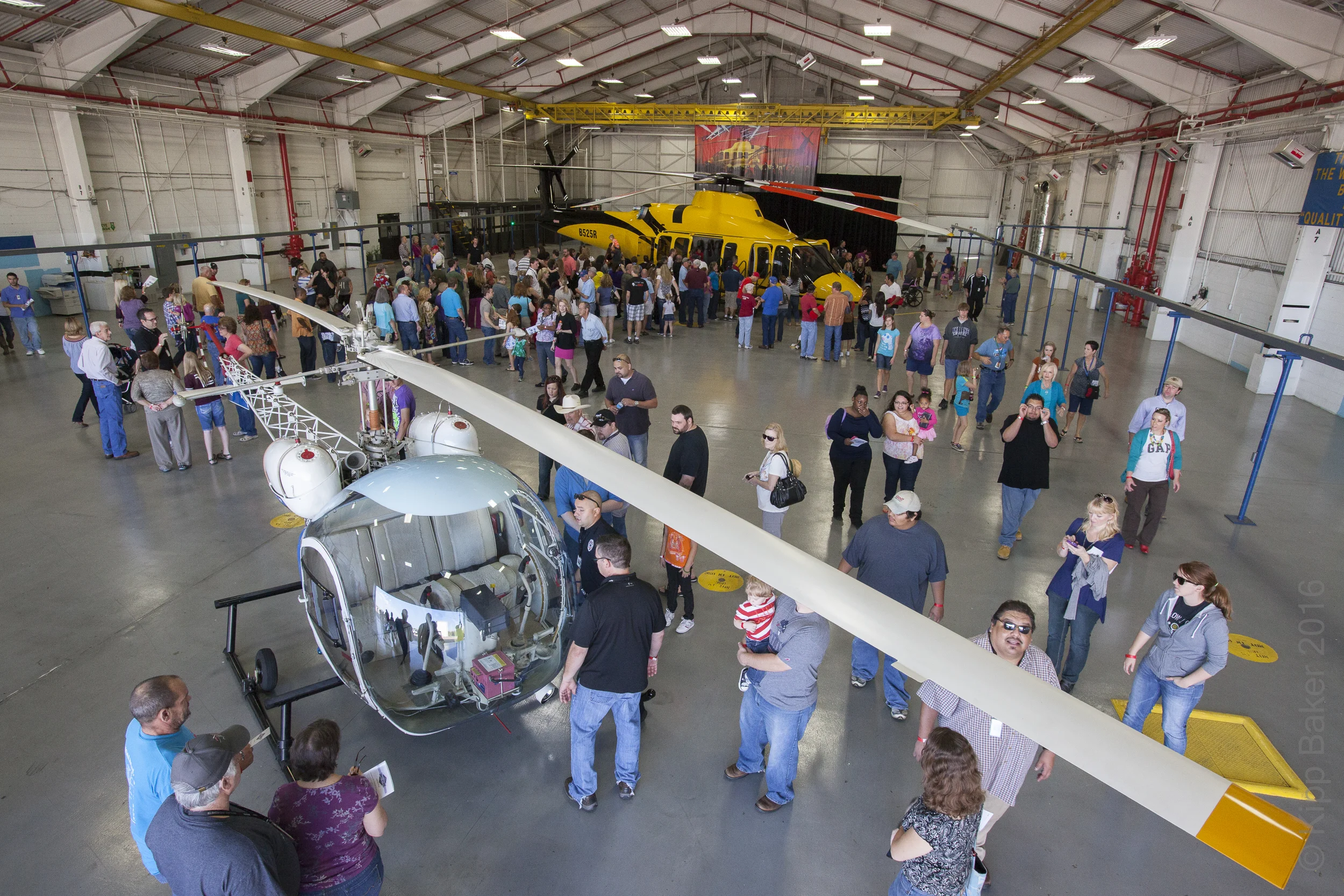 Bell Helicopter Family Day shows the worker's families their products. Here Bell's first commercial aircraft, "the 47" is on display with Bell Helicopter's latest, the 525 Relentless. Copyright © Kipp Baker, All rights reserved.