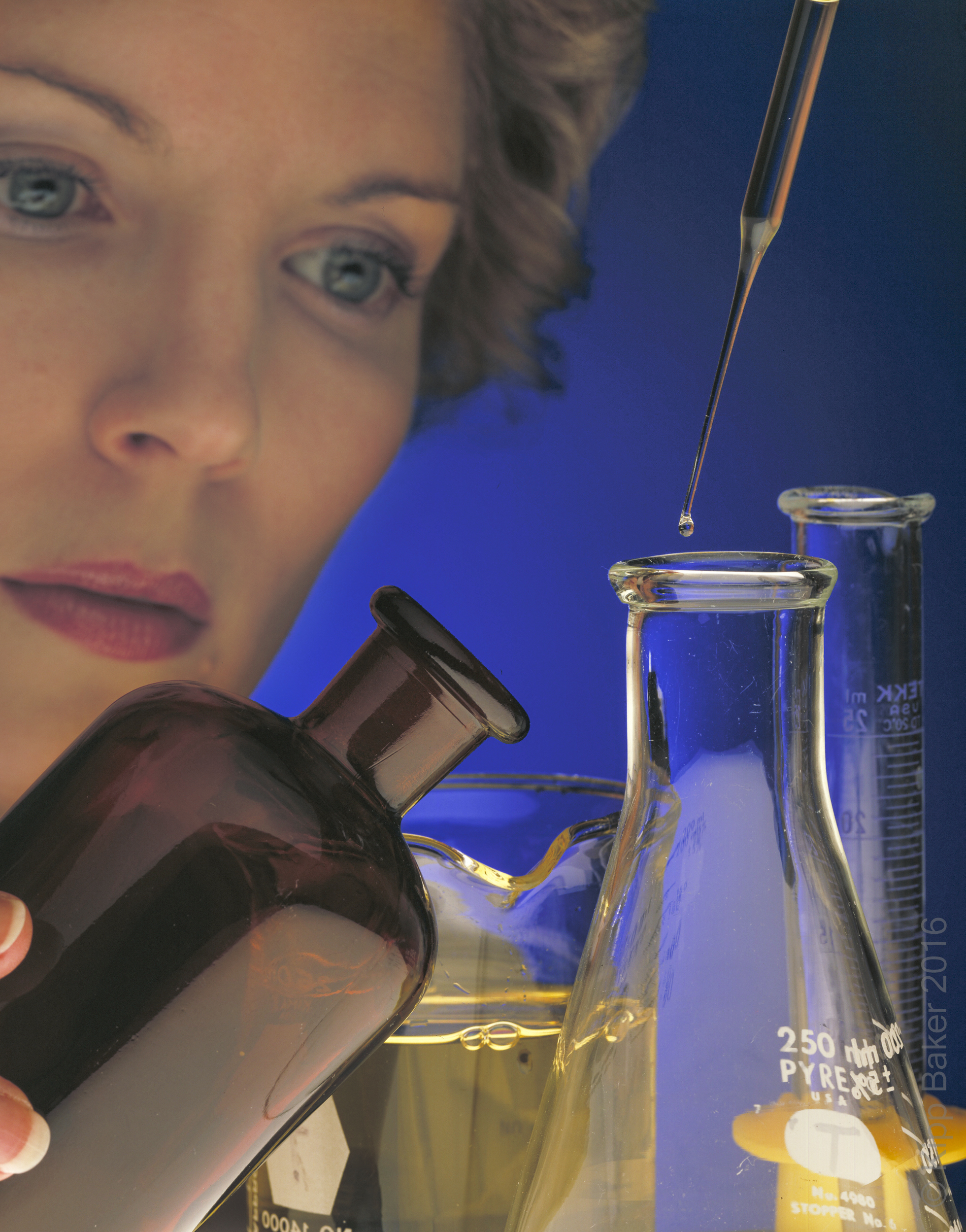Image of laboratory researcher used in healthcare annual report Copyright © Kipp Baker, All rights reserved.