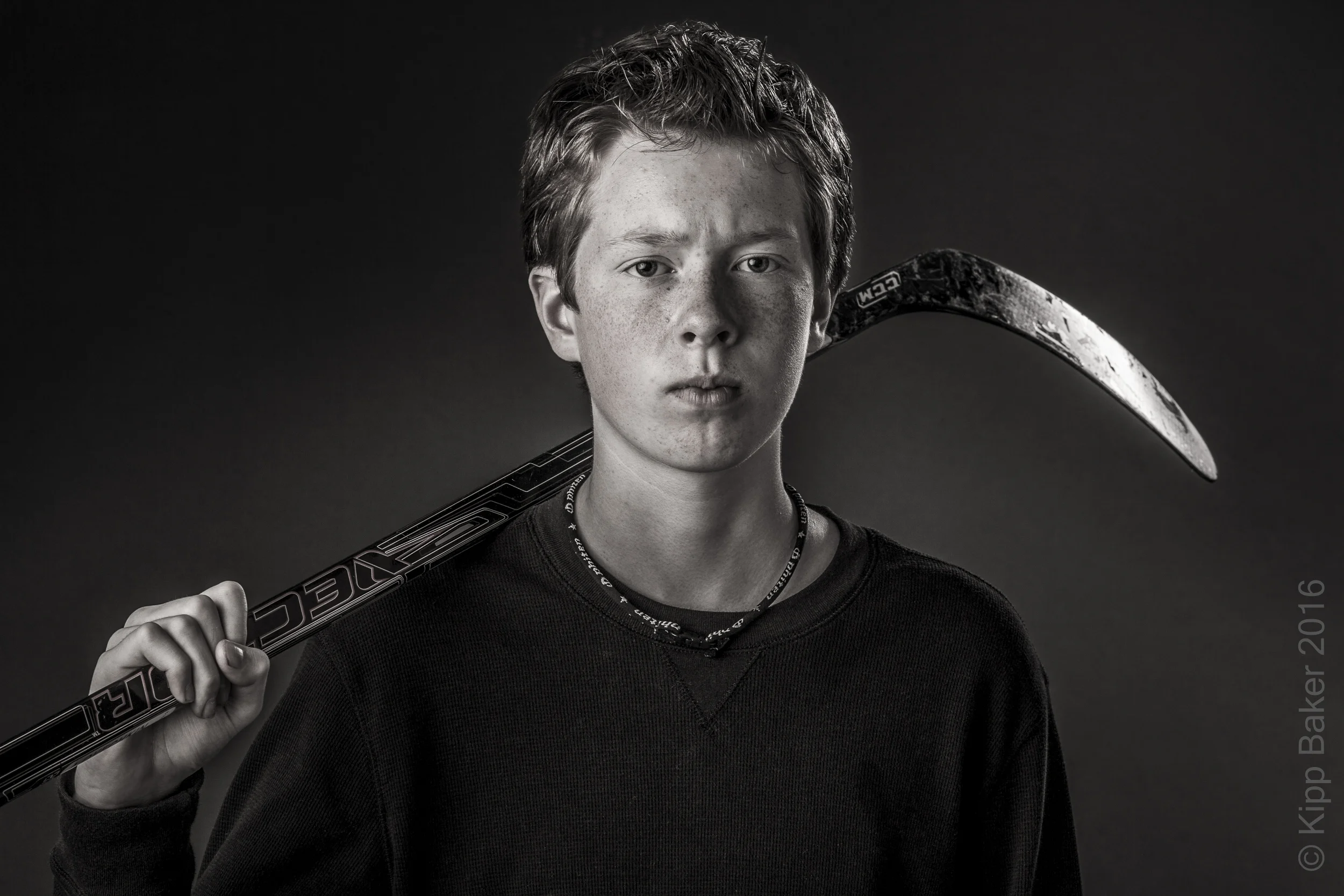 Alex R. and hockey stick Copyright © Kipp Baker, All rights reserved