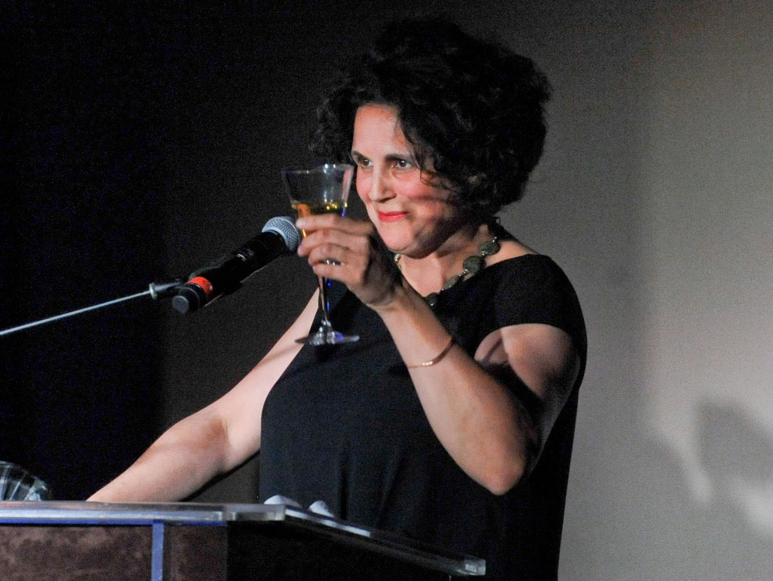 Jennifer Baichwal, f ilmmaker and this year's Co-Chair, salutes the artists at the 2014 Waterkeeper Gala. (Photo: Lake Ontario Waterkeeper)