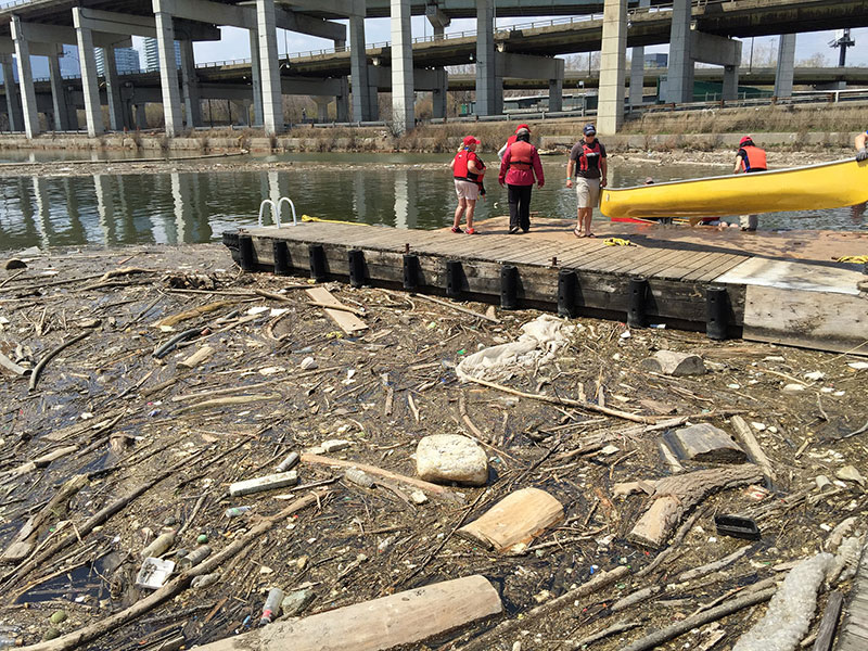 Trash accumulating in the Keating Channel – the landing site for paddlers at the end of the course. (Photo: Lake Ontario Waterkeeper)