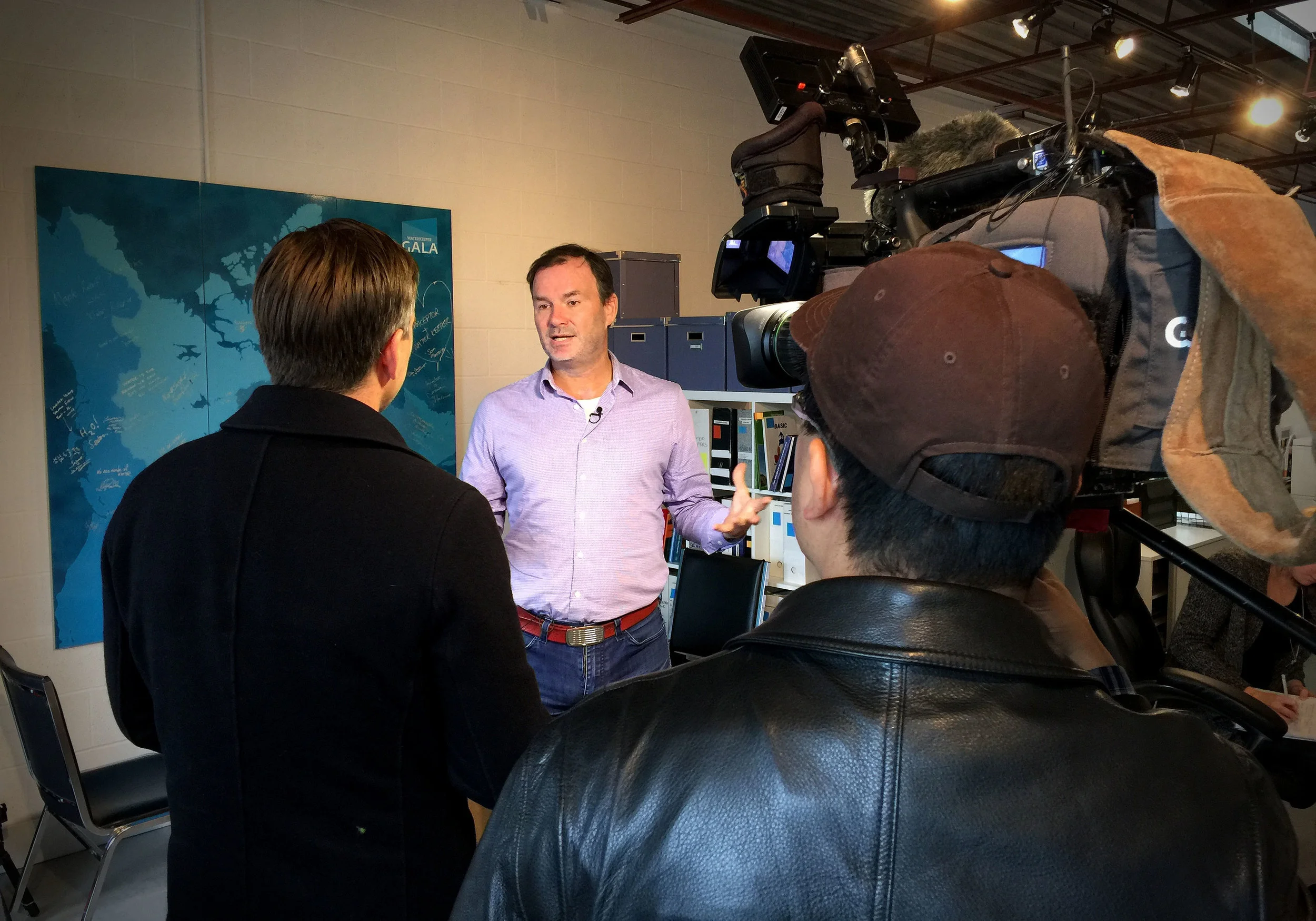 Global News Toronto's Mark McAllister interviewing Waterkeeper Mark Mattson at the Waterkeeper office. (Photo via Lake Ontario Waterkeeper)