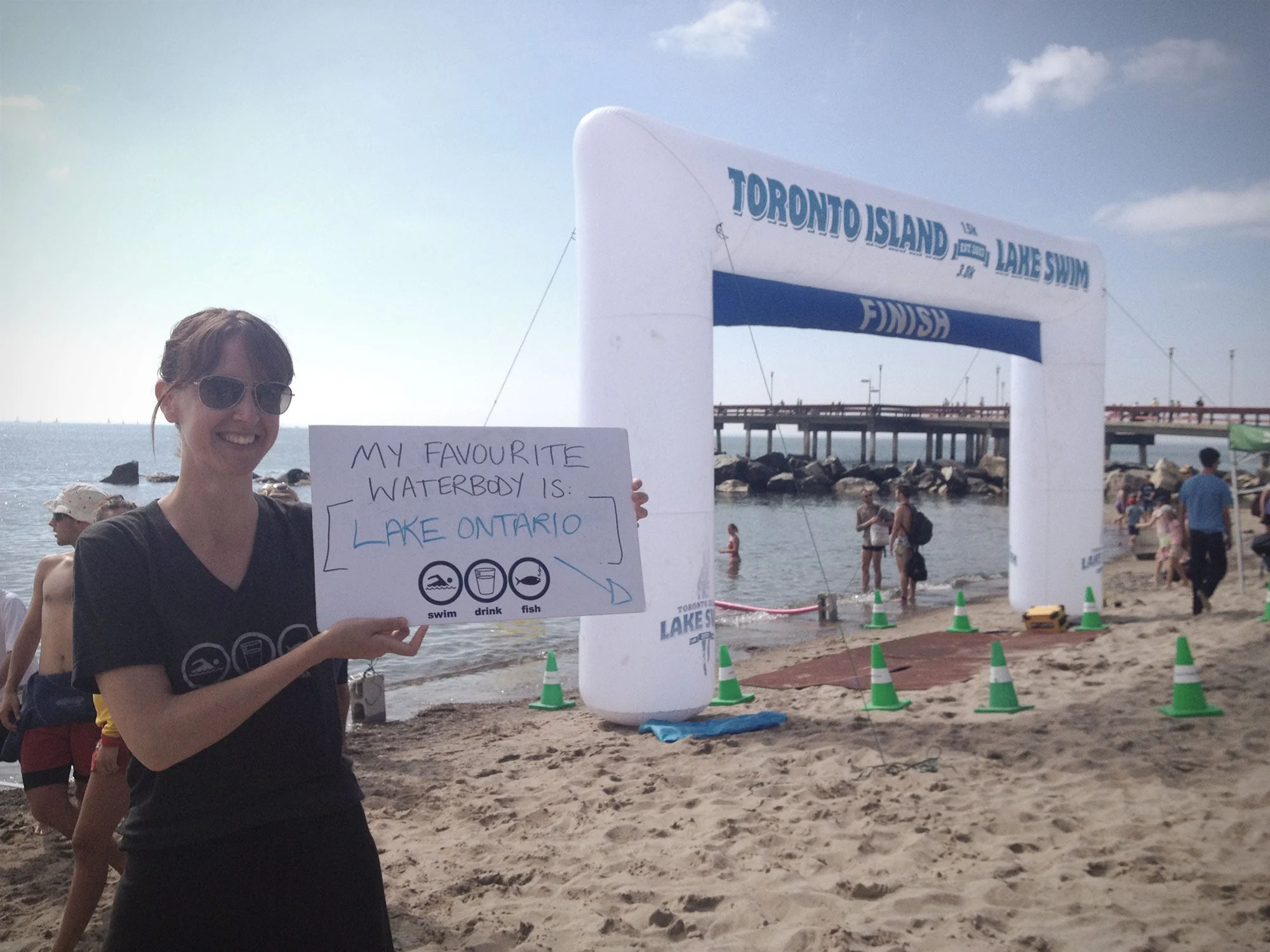 Krystyn showing her love for her favourite waterbody at the 2013 Toronto Island Lake Swim. (Photo via Lake Ontario Waterkeeper)