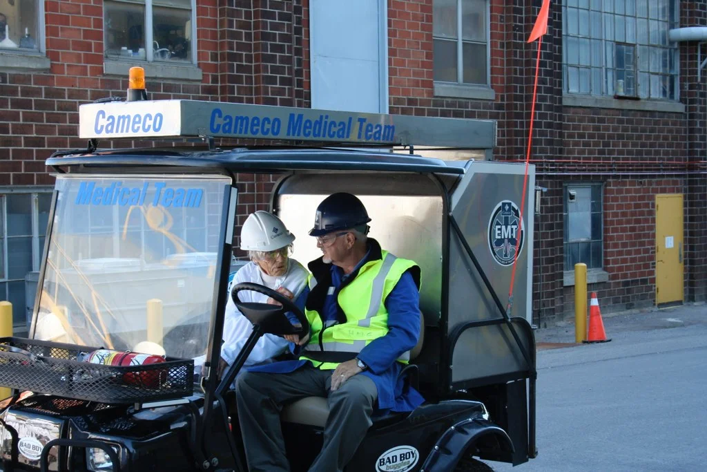 Pat Lawson receives a tour of the Cameco fuel conversion facility in Port Hope, 2009.