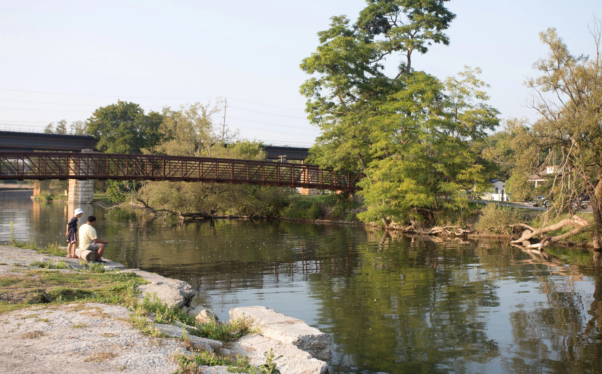 Locals casting a line in Port Hope's Cameco area. (Photo by Krystyn Tully)