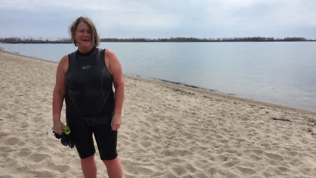 Kathleen McDonnell enjoying her frontyard, Lake Ontario. (Image via CBC )