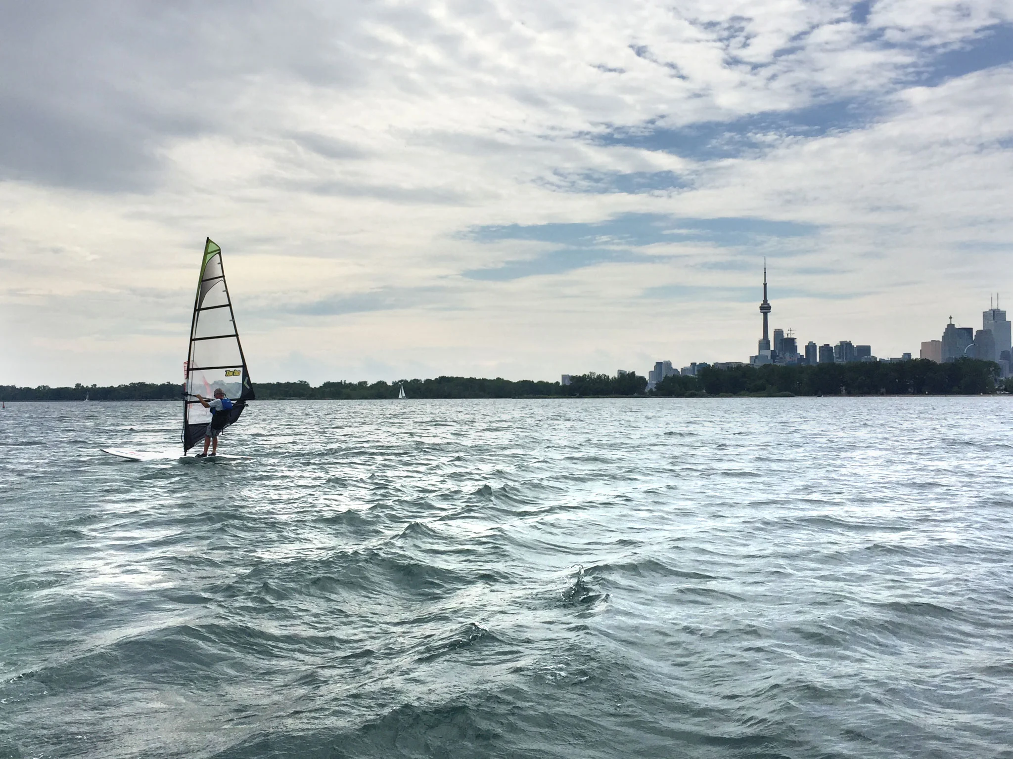 Windsurfer looking for speed outside of the Eastern Channel. (Photo by Lake Ontario Waterkeeper)