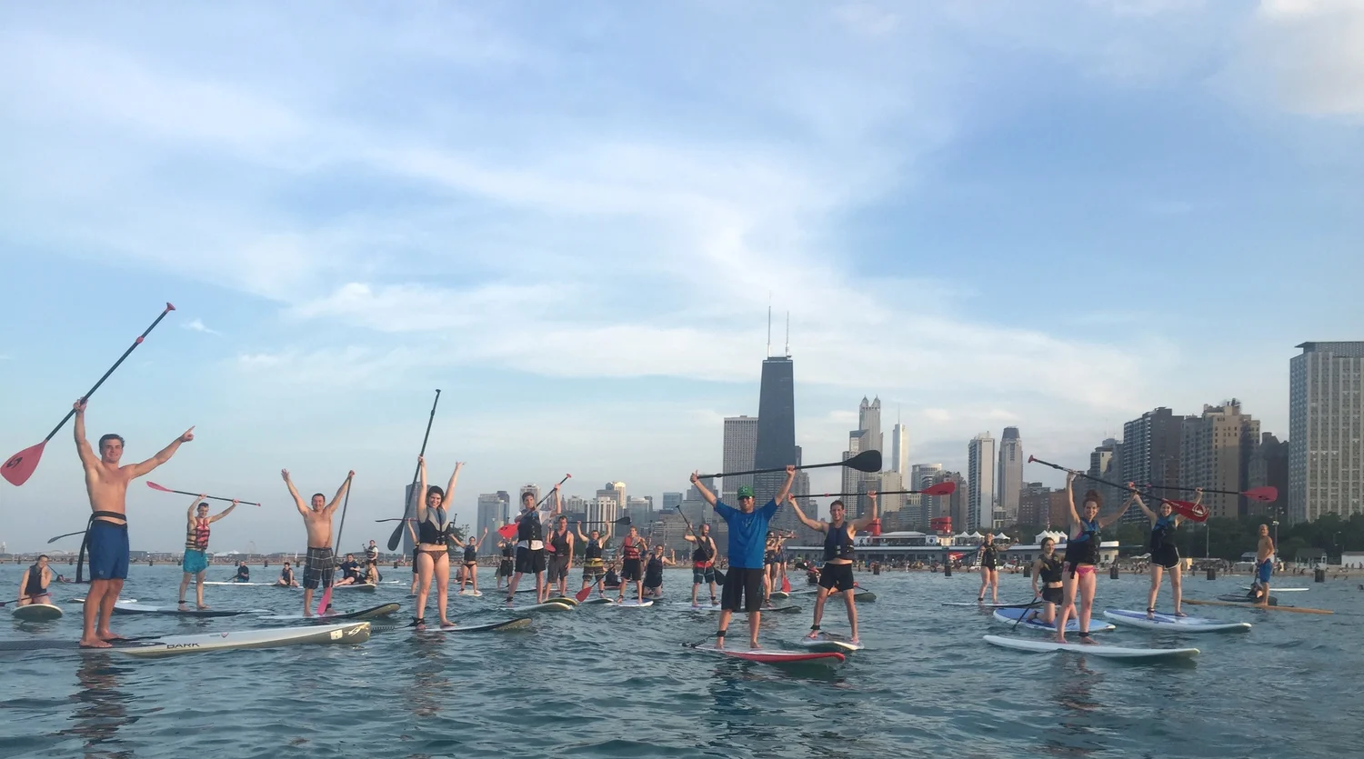 Paddlerboarders taking over Chicago's shoreline. (Photo via ChicagoSUP )