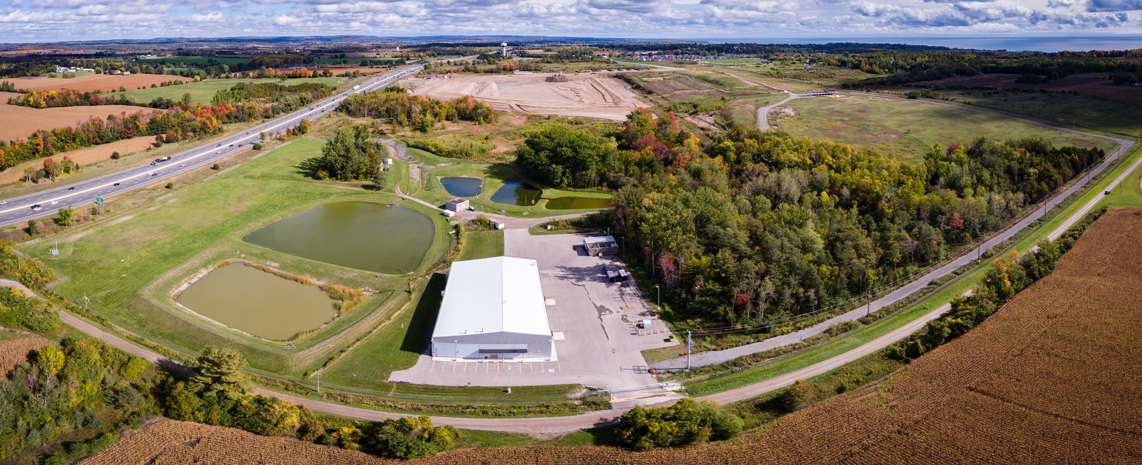 The water treatment facility with the long-term storage site in the background. (Photo by Dylan Neild)