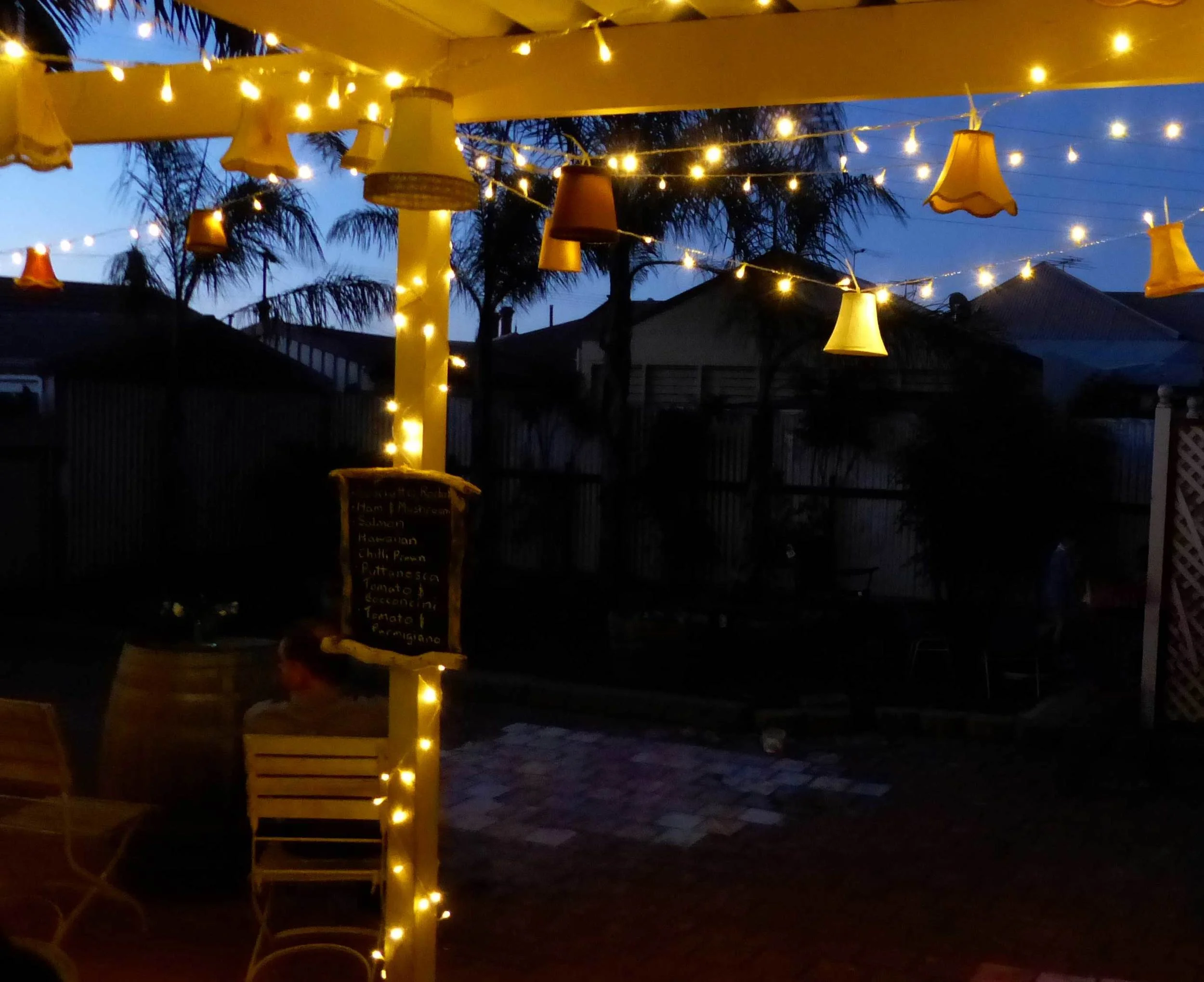  At a recent event we hung them underneath a pergola along with fairy lights.
